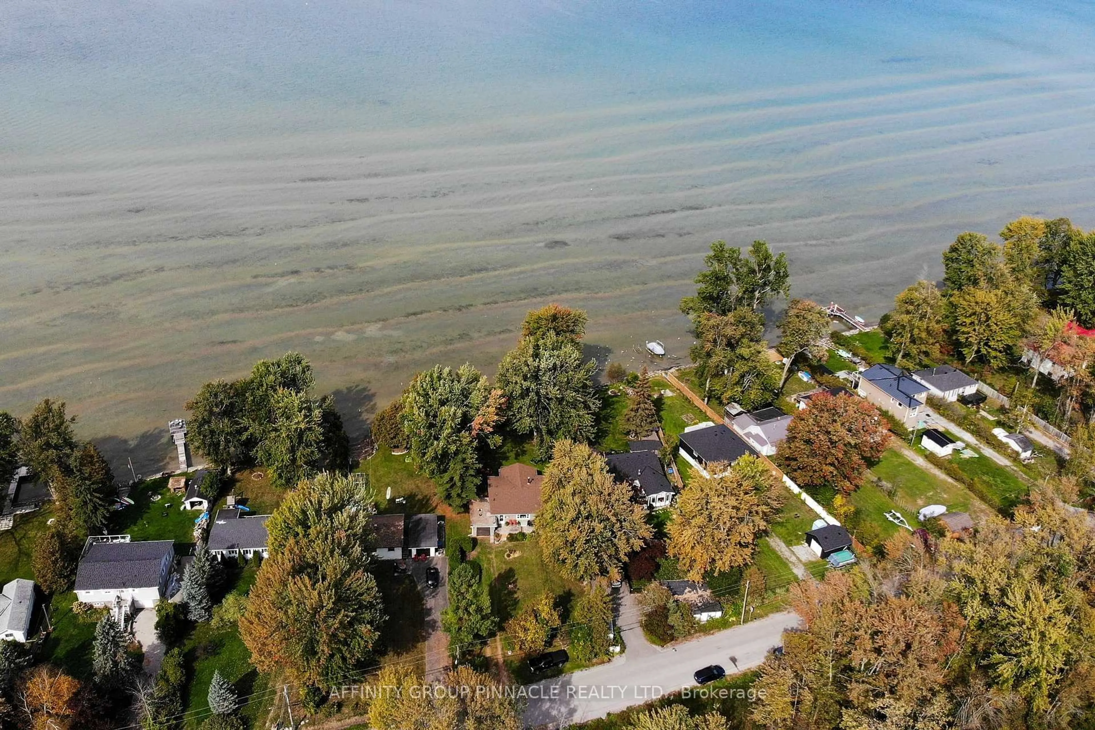 A pic from outside/outdoor area/front of a property/back of a property/a pic from drone, water/lake/river/ocean view for 120 Irving Dr, Georgina Ontario L0E 1N0