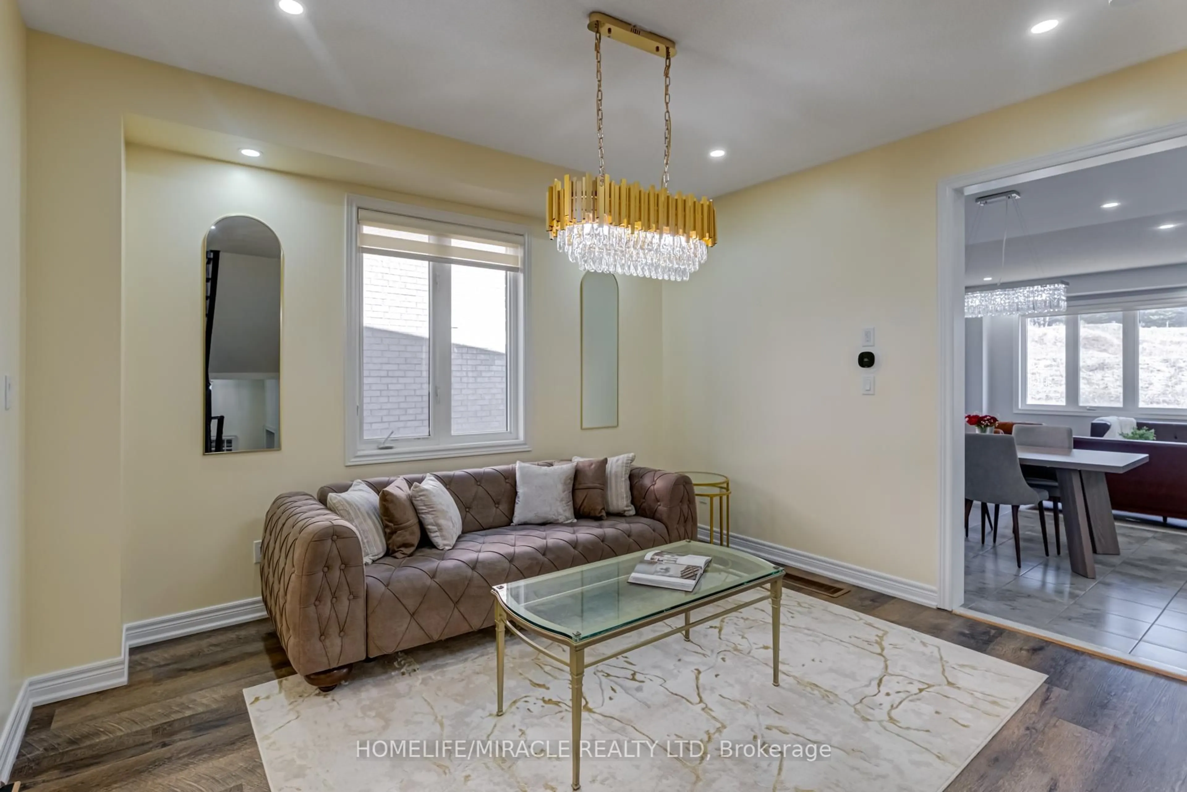 Living room with furniture, unknown for 57 Sutcliffe Way, New Tecumseth Ontario L9R 0N8