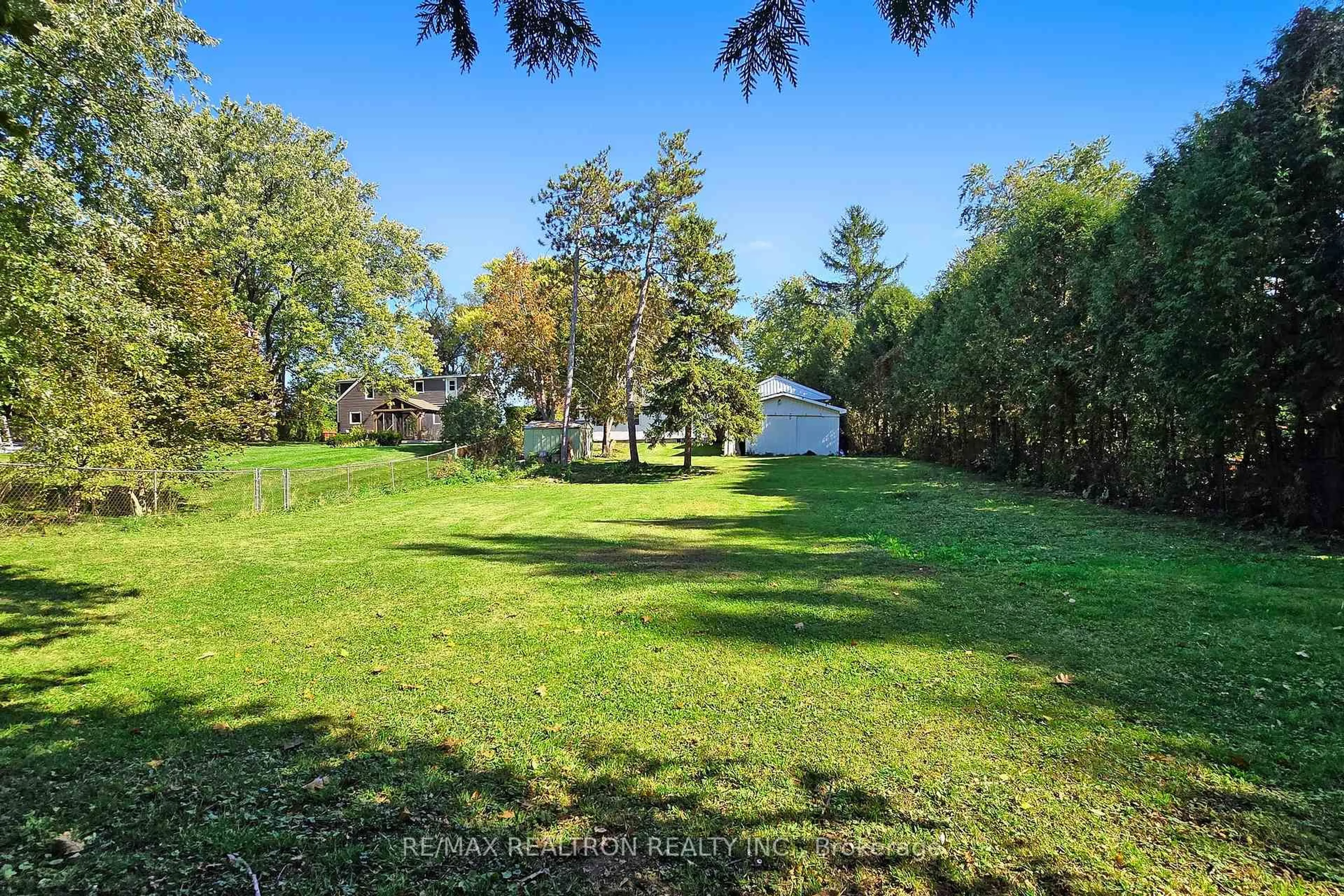 A pic from outside/outdoor area/front of a property/back of a property/a pic from drone, water/lake/river/ocean view for 14376 Jane St, King Ontario L7B 1A3