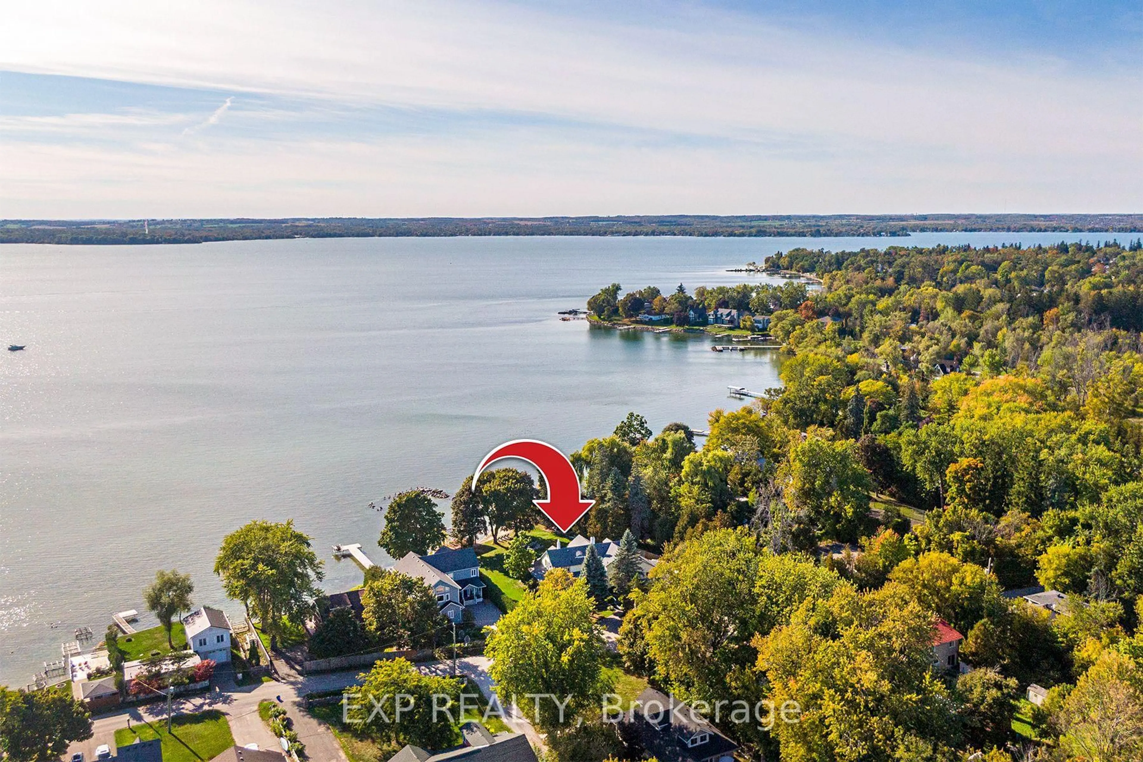 A pic from outside/outdoor area/front of a property/back of a property/a pic from drone, water/lake/river/ocean view for 376 Lake Dr, Georgina Ontario L4P 3C8