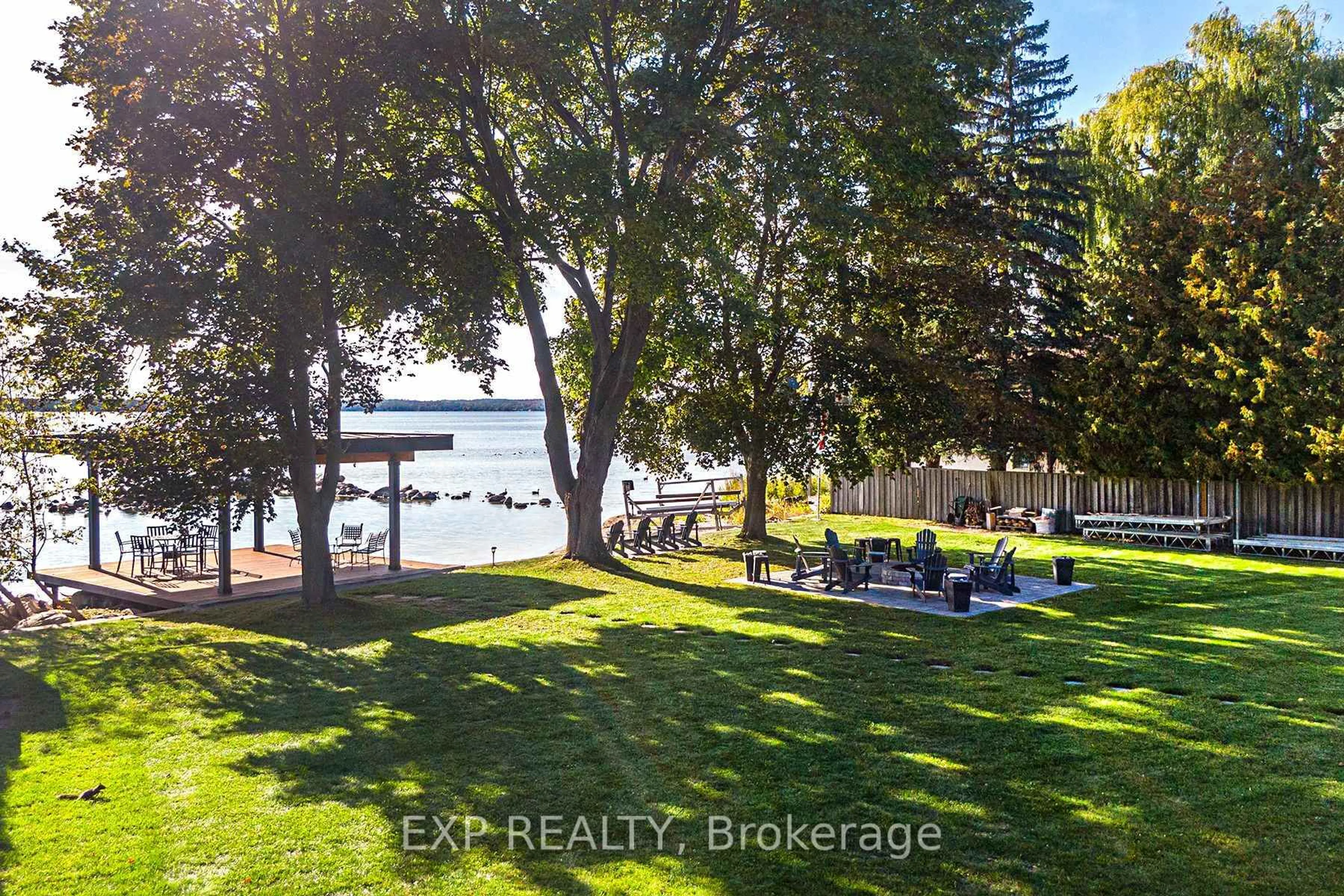 A pic from outside/outdoor area/front of a property/back of a property/a pic from drone, water/lake/river/ocean view for 376 Lake Dr, Georgina Ontario L4P 3C8