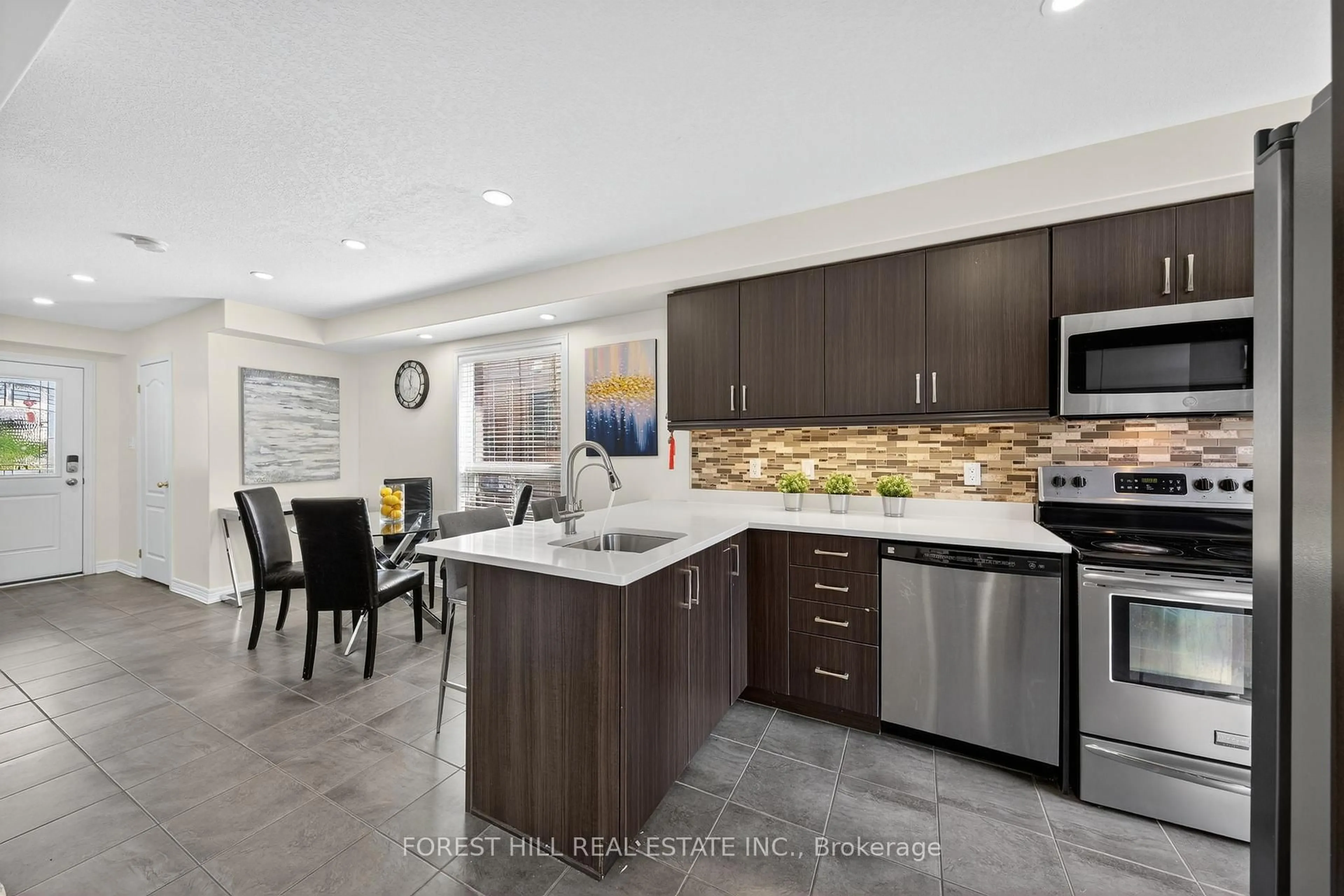 Open concept kitchen, ceramic/tile floor for 160 Banting Cres, Essa Ontario L0M 1B6