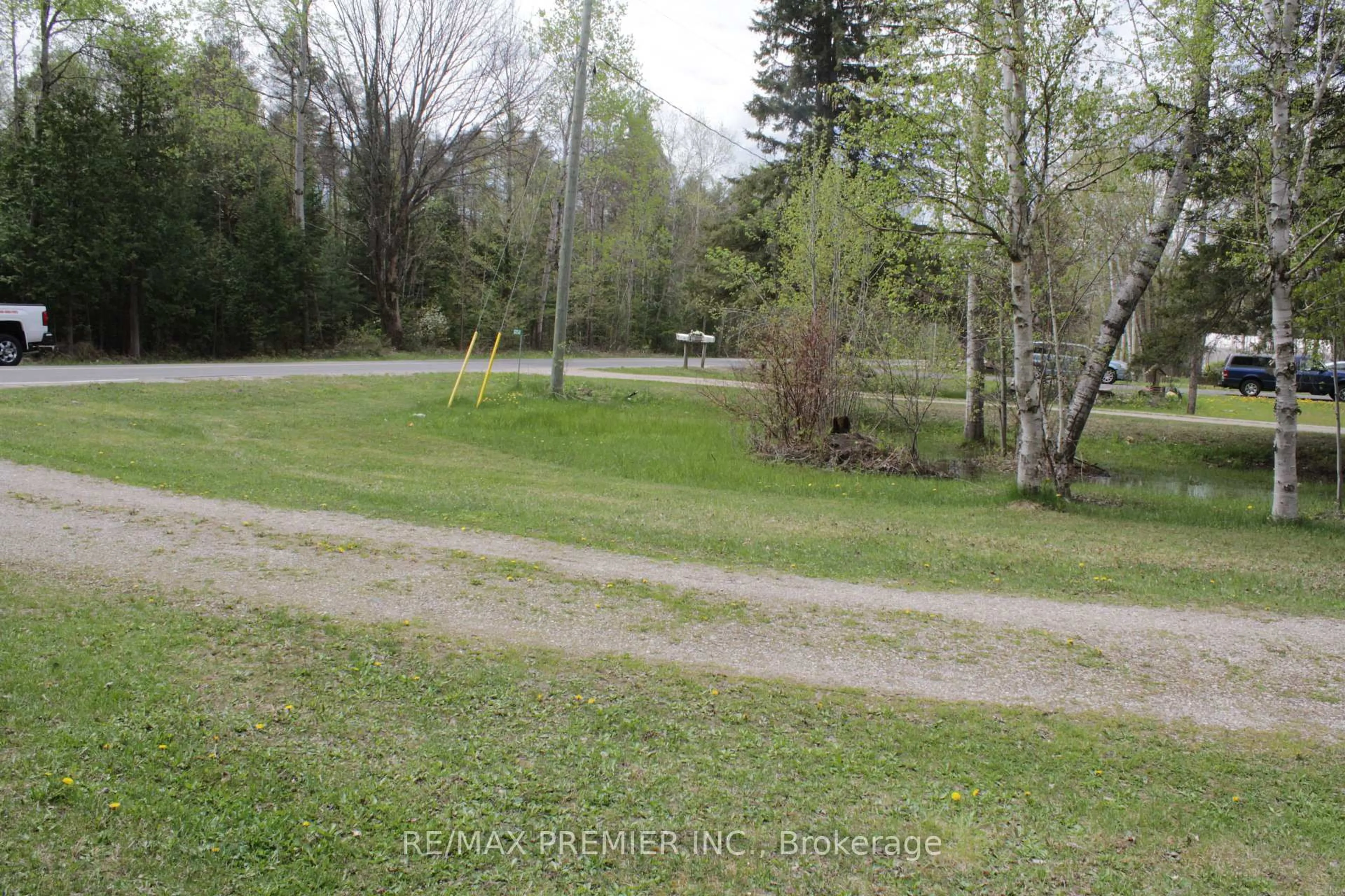 A pic from outside/outdoor area/front of a property/back of a property/a pic from drone, forest/trees view for 5258 30th Side Rd, Essa Ontario L0M 1T0