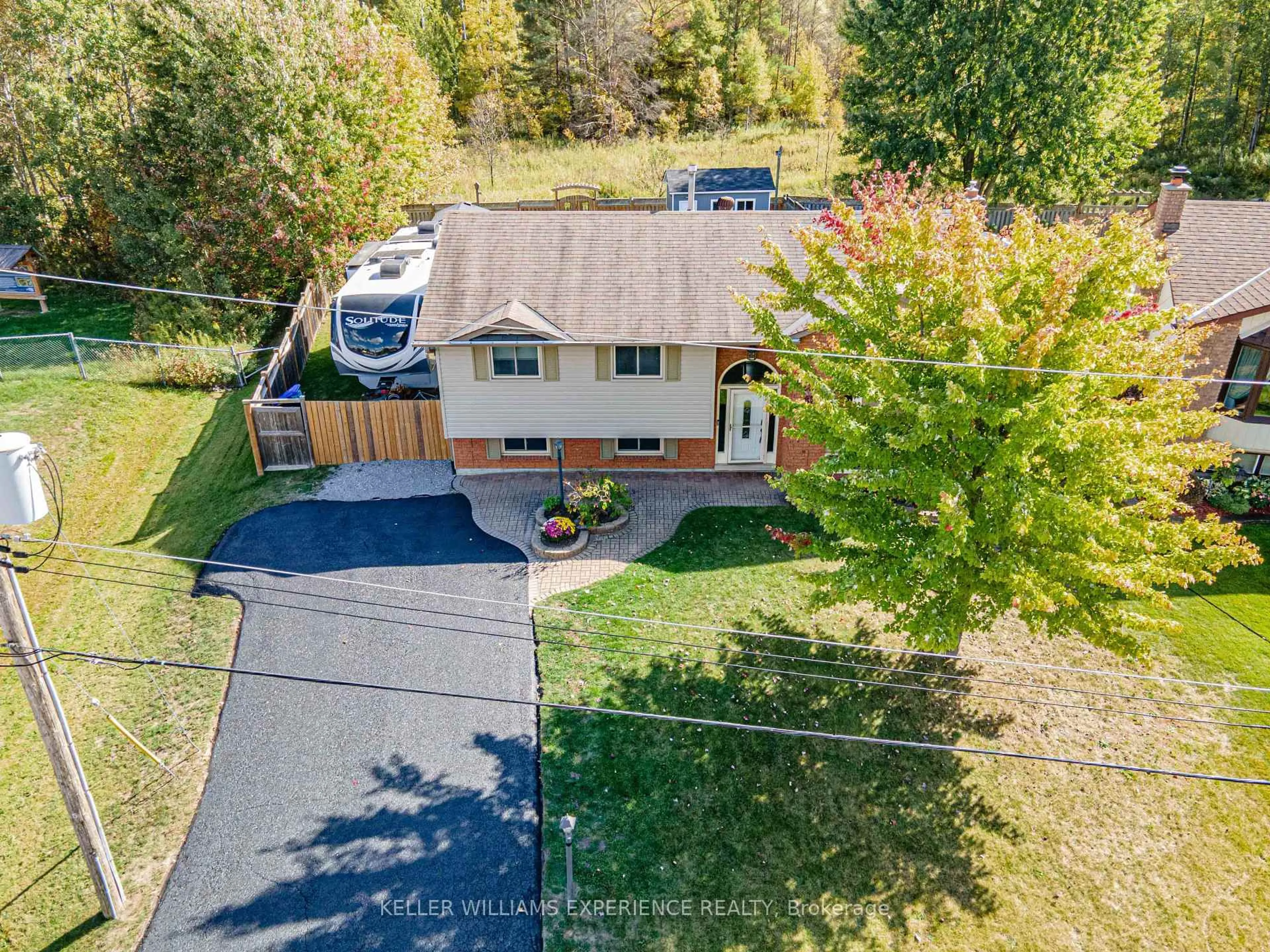 A pic from outside/outdoor area/front of a property/back of a property/a pic from drone, street for 52 ROTH St, Essa Ontario L3W 0G7