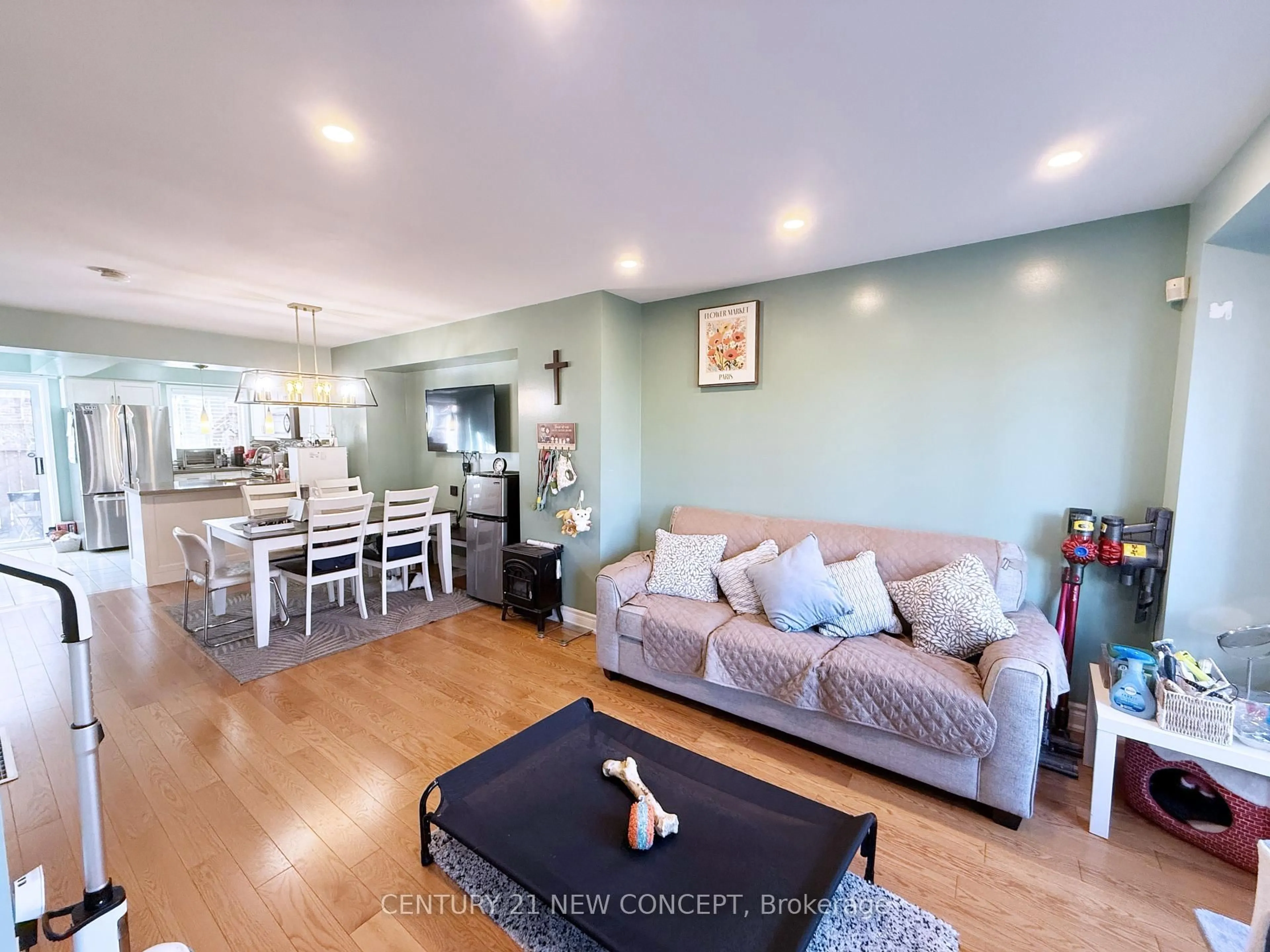 Living room with furniture, wood/laminate floor for 18 Clark Ave #107, Vaughan Ontario L4J 8H1