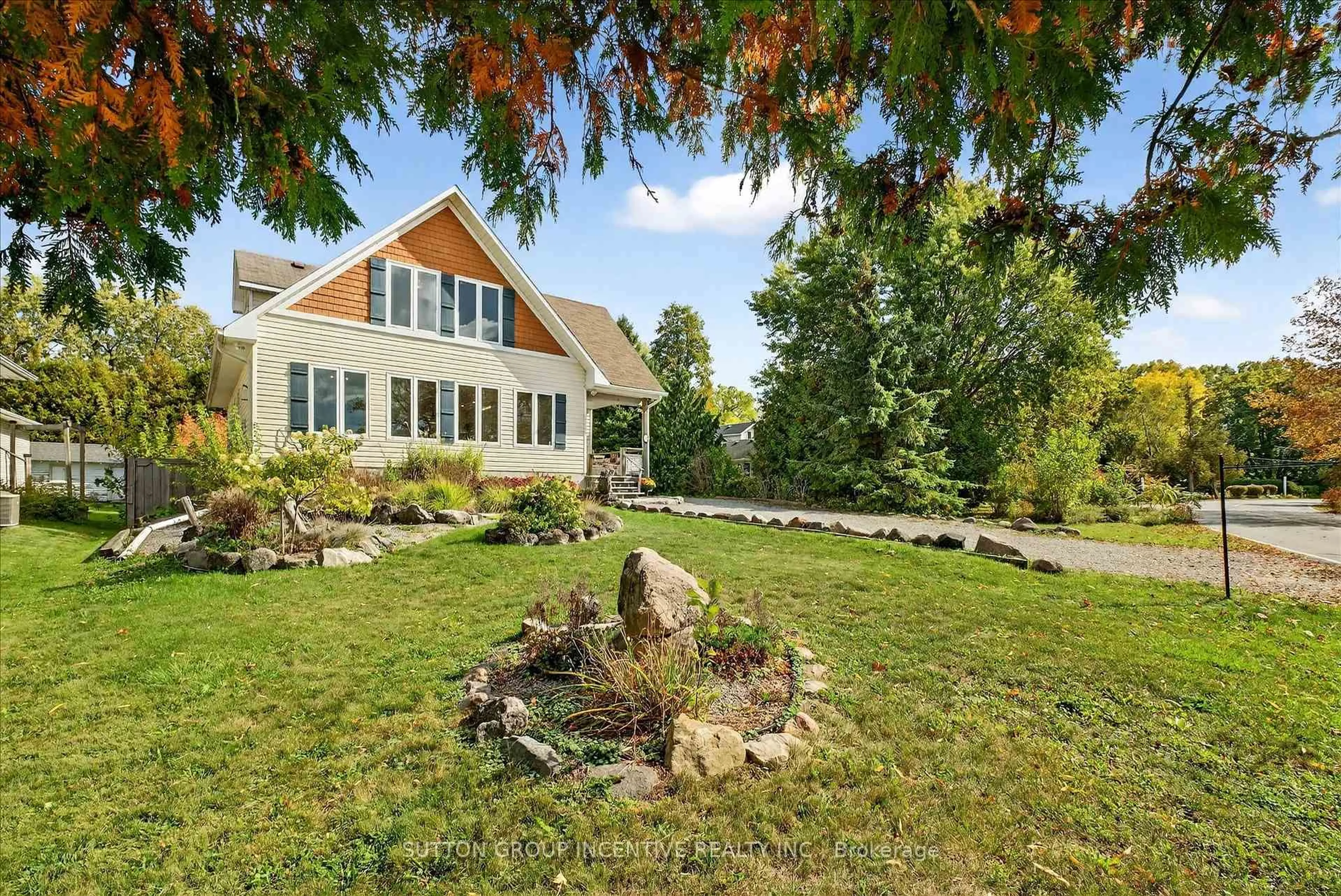 A pic from outside/outdoor area/front of a property/back of a property/a pic from drone, water/lake/river/ocean view for 183 Lake Dr, Georgina Ontario L4P 3C8