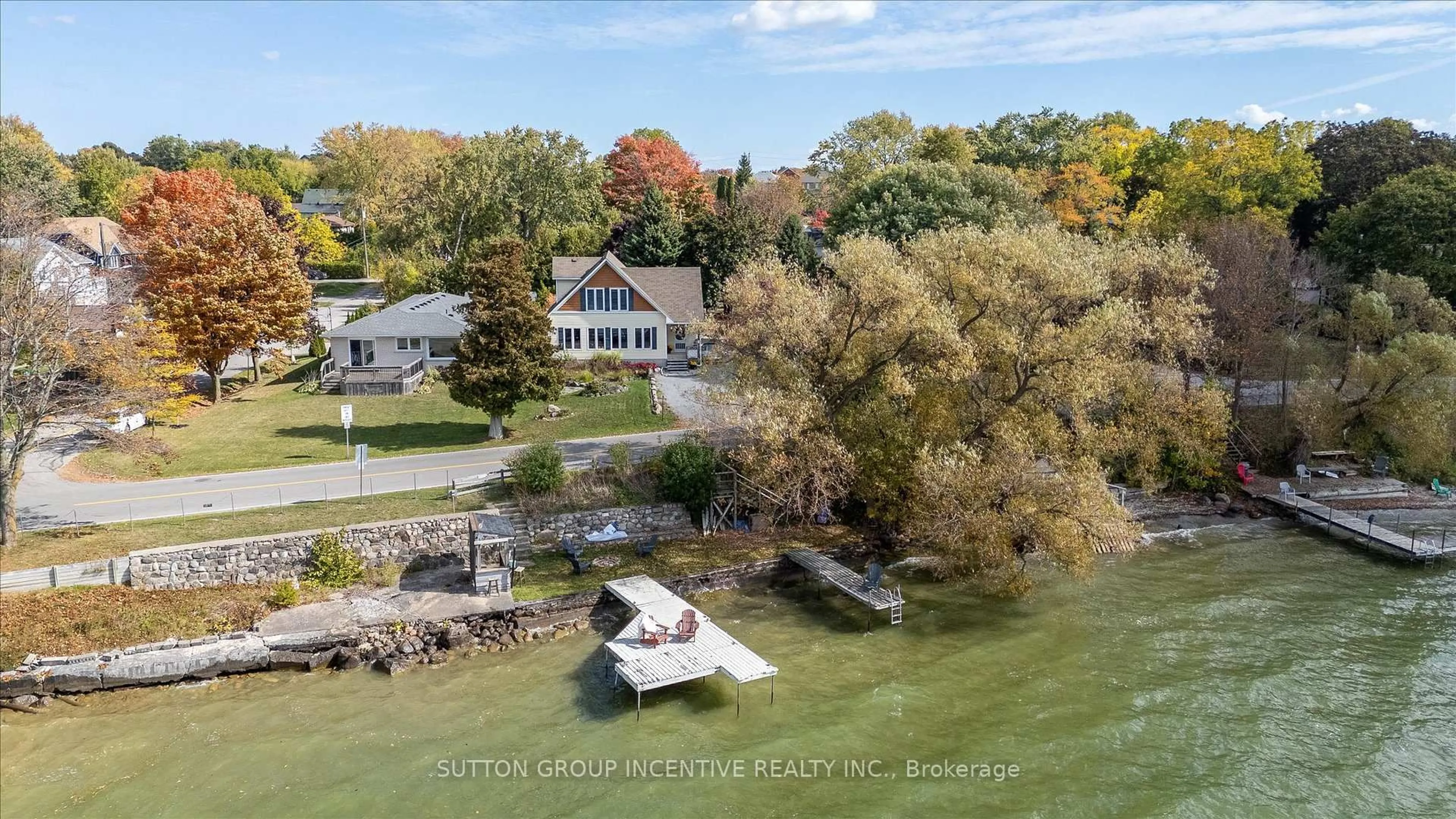A pic from outside/outdoor area/front of a property/back of a property/a pic from drone, water/lake/river/ocean view for 183 Lake Dr, Georgina Ontario L4P 3C8