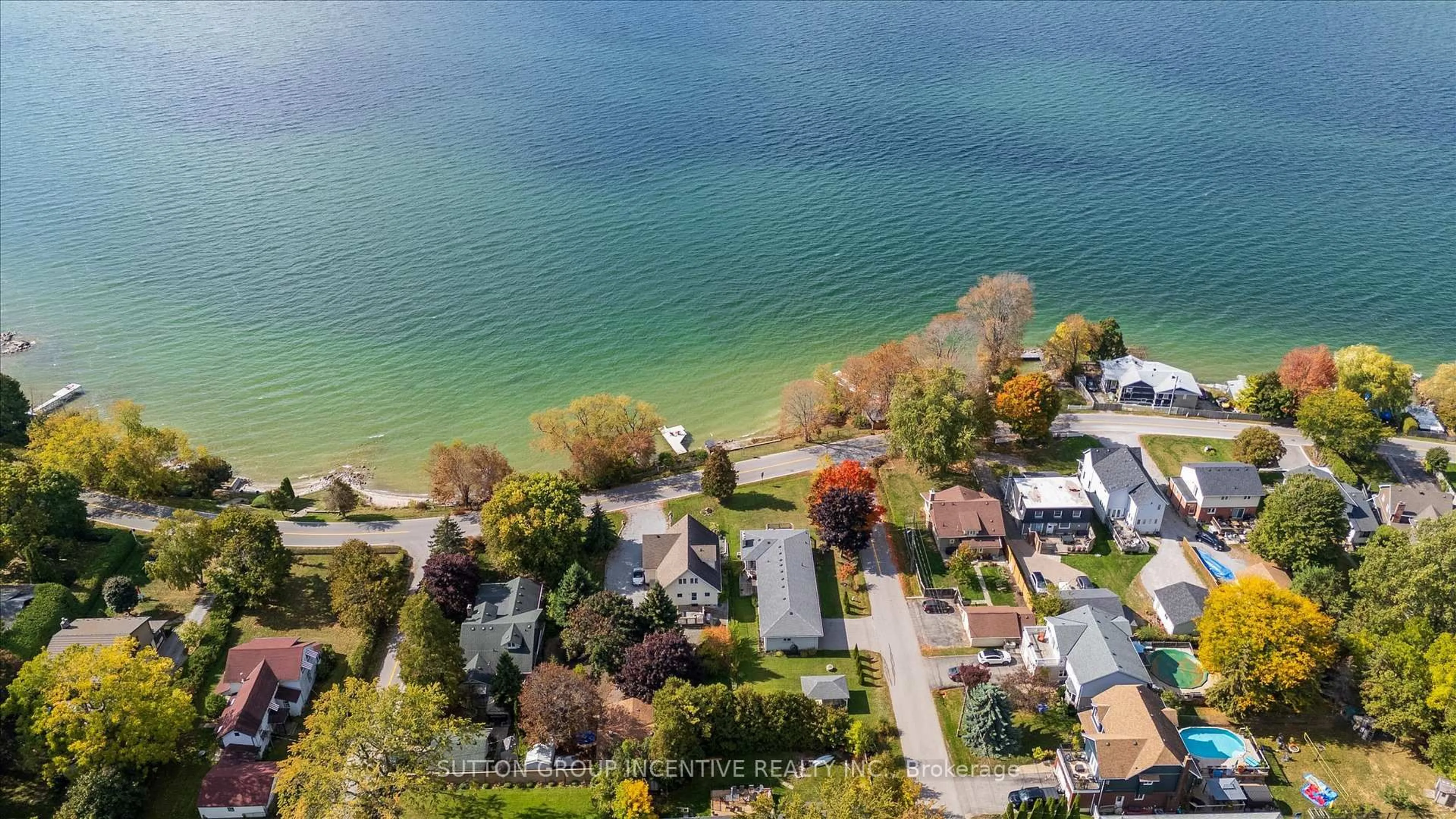 A pic from outside/outdoor area/front of a property/back of a property/a pic from drone, water/lake/river/ocean view for 183 Lake Dr, Georgina Ontario L4P 3C8