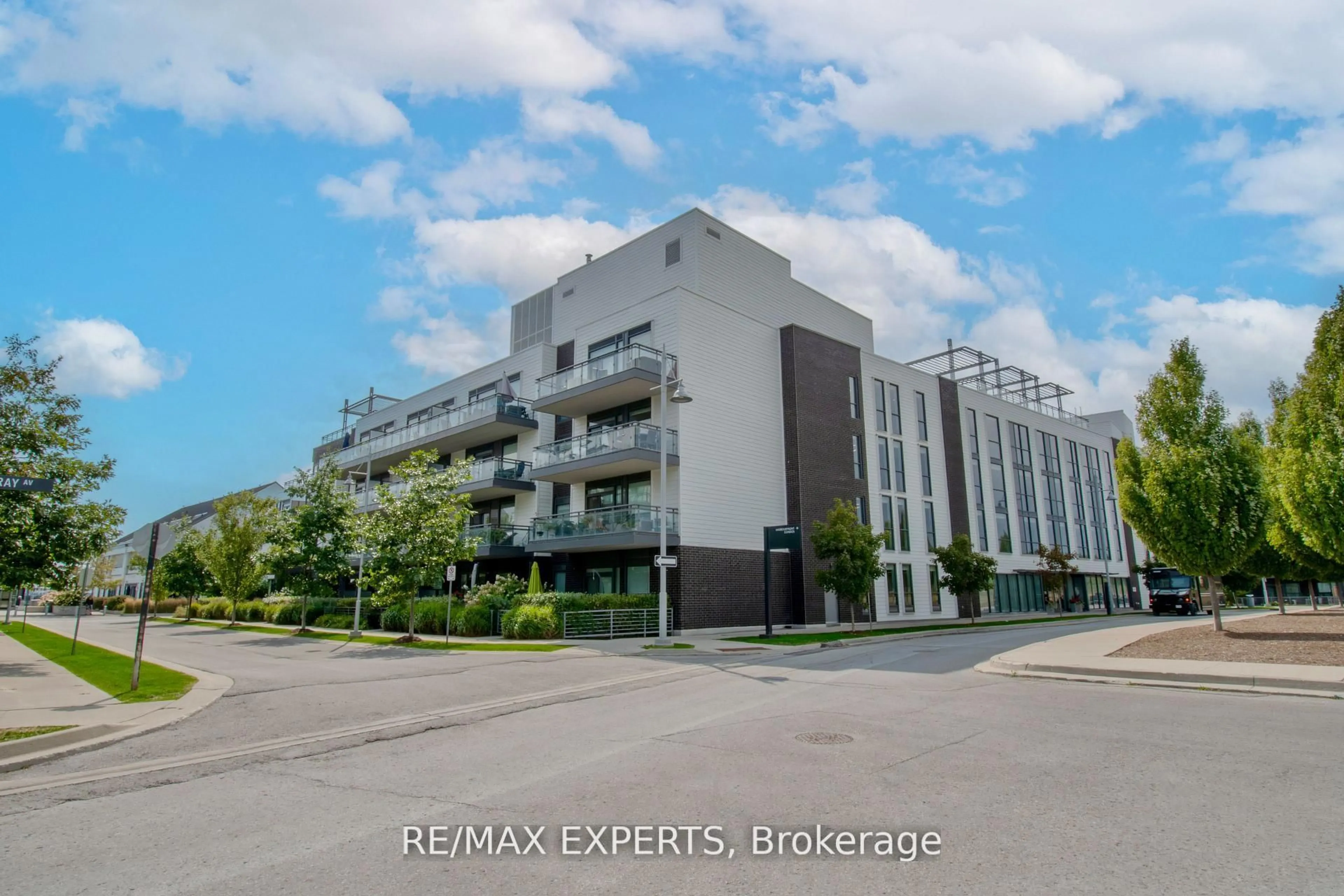 A pic from outside/outdoor area/front of a property/back of a property/a pic from drone, street for 301 Sea Ray Ave #C315, Innisfil Ontario L9S 0L8