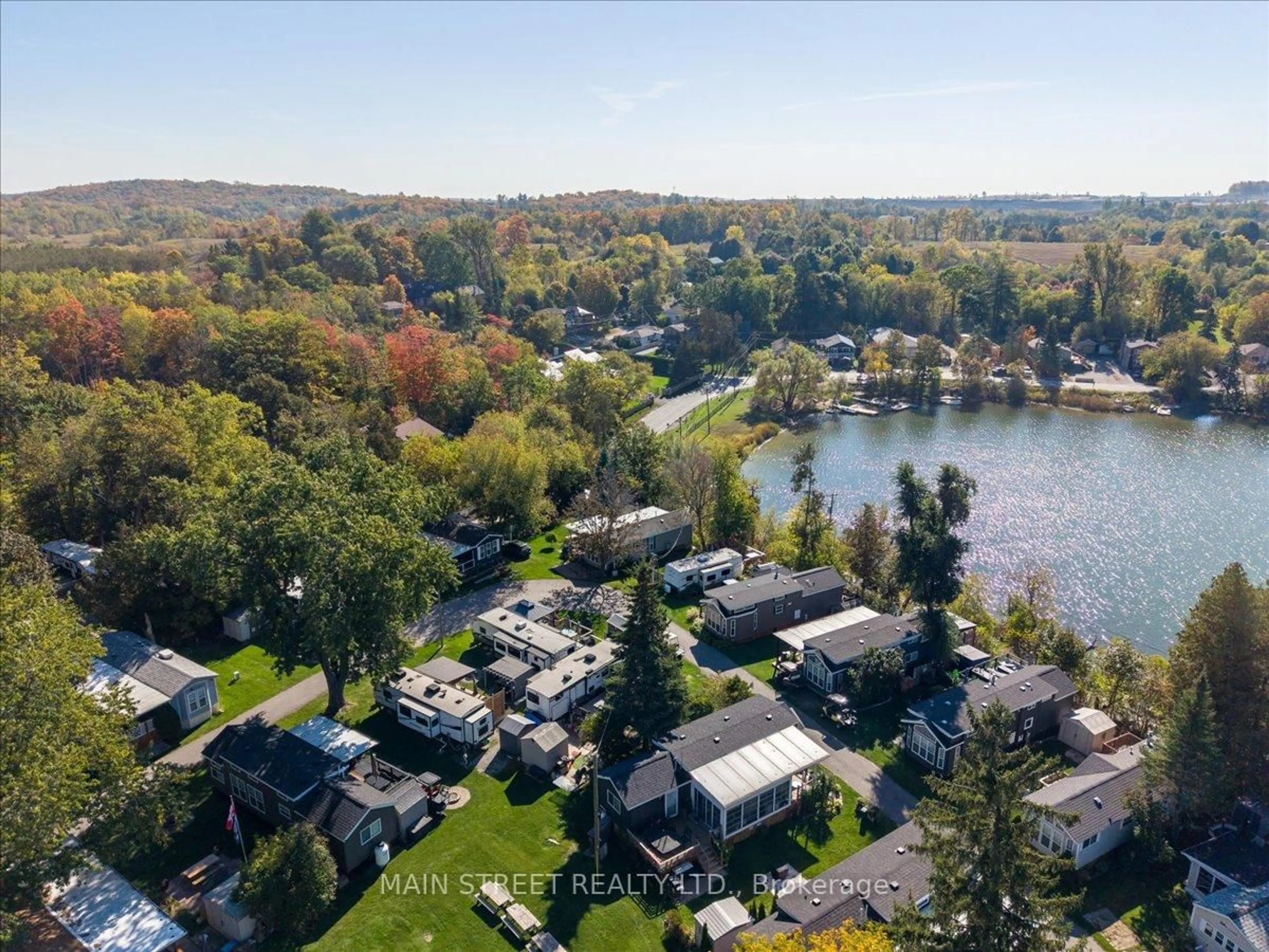 A pic from outside/outdoor area/front of a property/back of a property/a pic from drone, water/lake/river/ocean view for 15 Hawaiian Circ, Whitchurch-Stouffville Ontario L0G 1E0