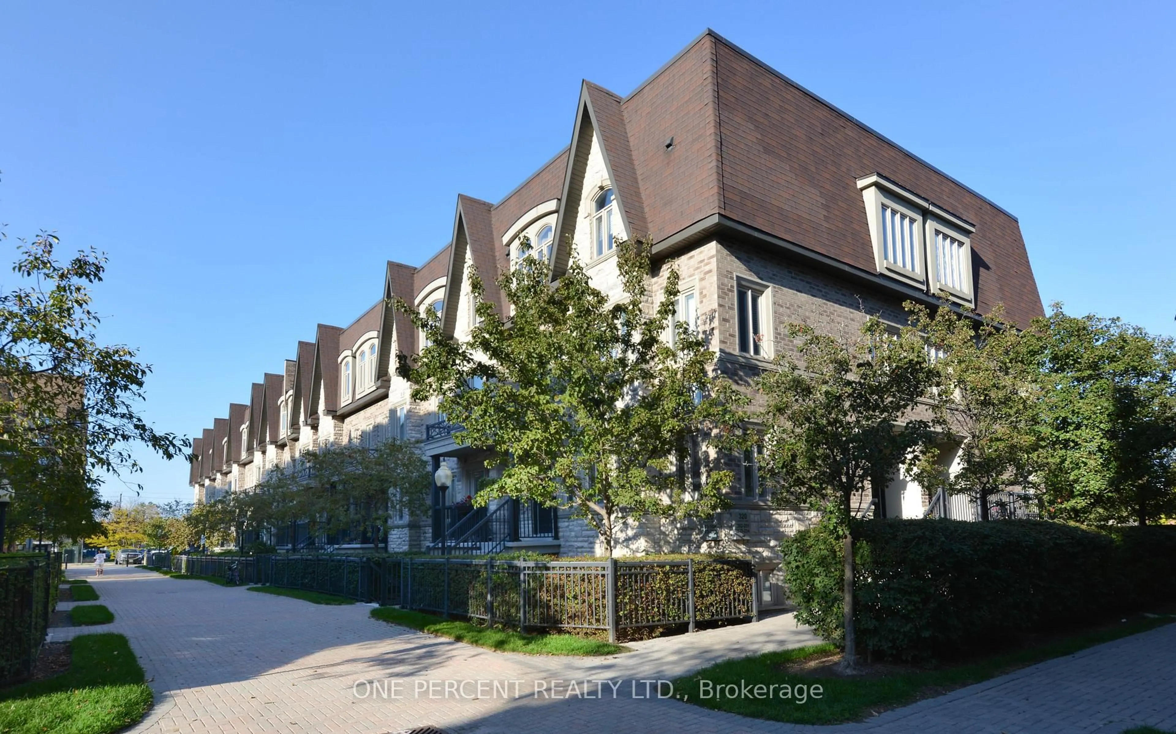 Home with brick exterior material, street for 320 John St #201, Markham Ontario L3T 0B1