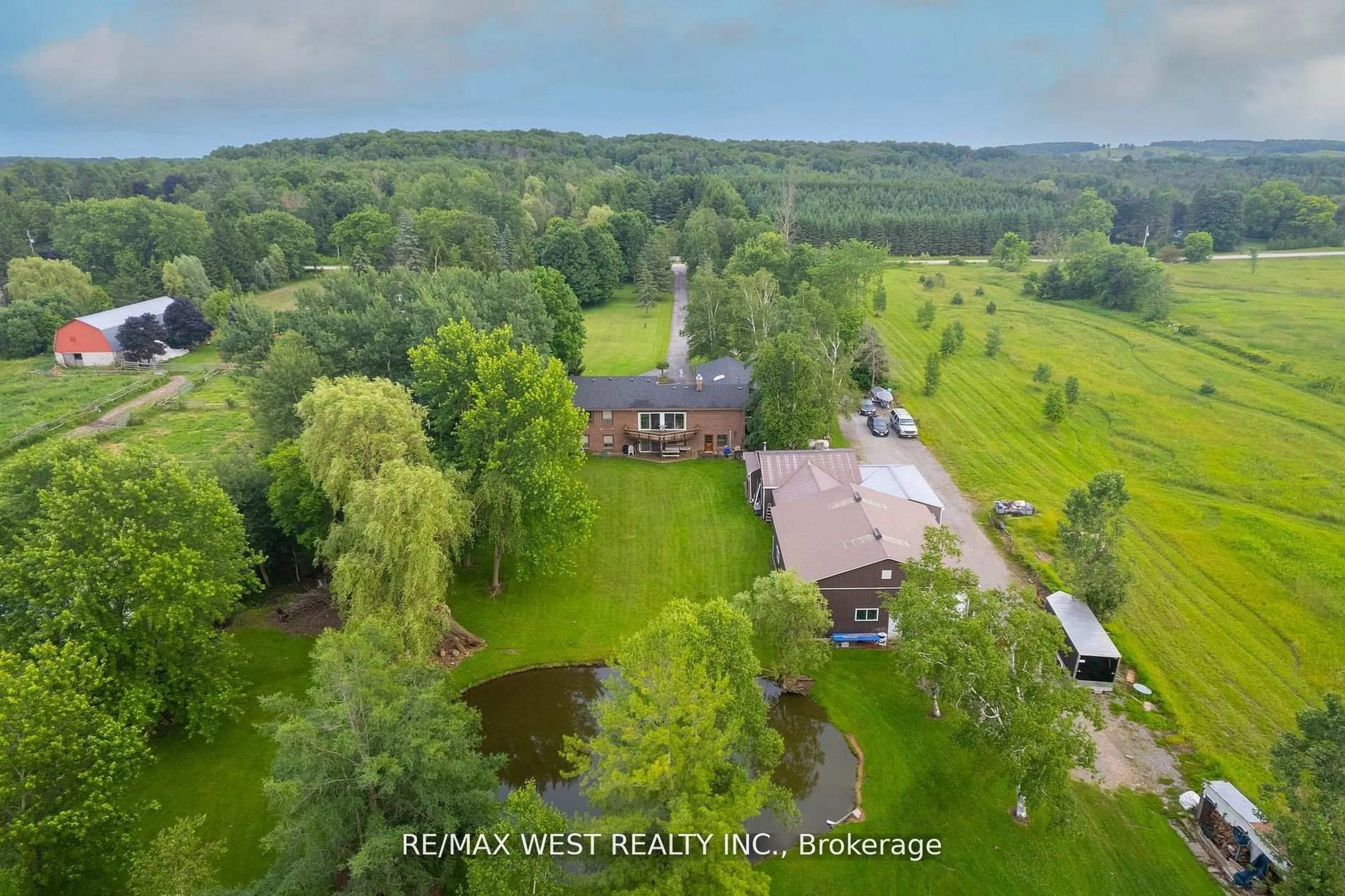 A pic from outside/outdoor area/front of a property/back of a property/a pic from drone, water/lake/river/ocean view for 5878 4th Line, New Tecumseth Ontario L0G 1W0