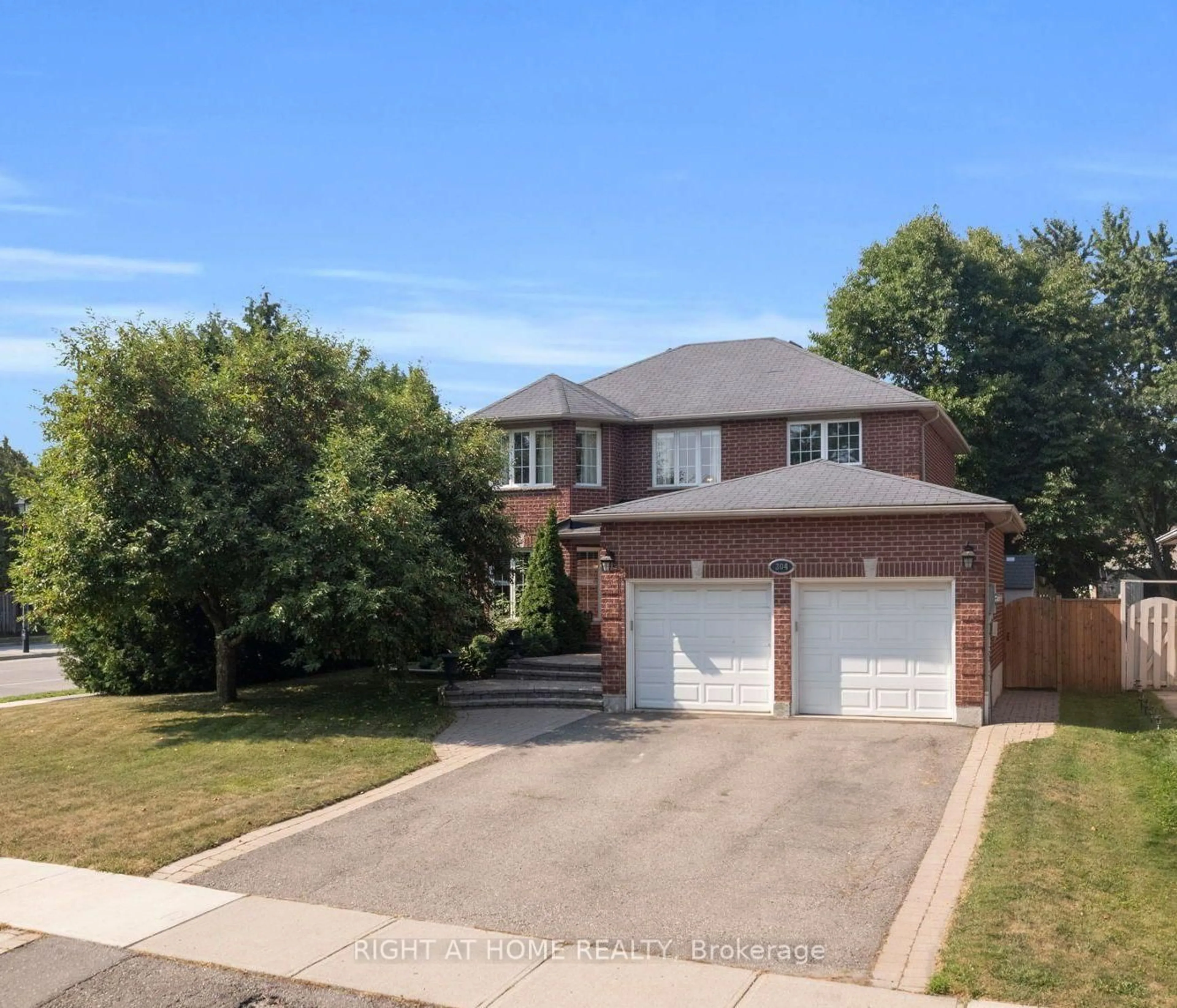Home with brick exterior material, street for 304 Rhodes Circ, Newmarket Ontario L3X 1V4