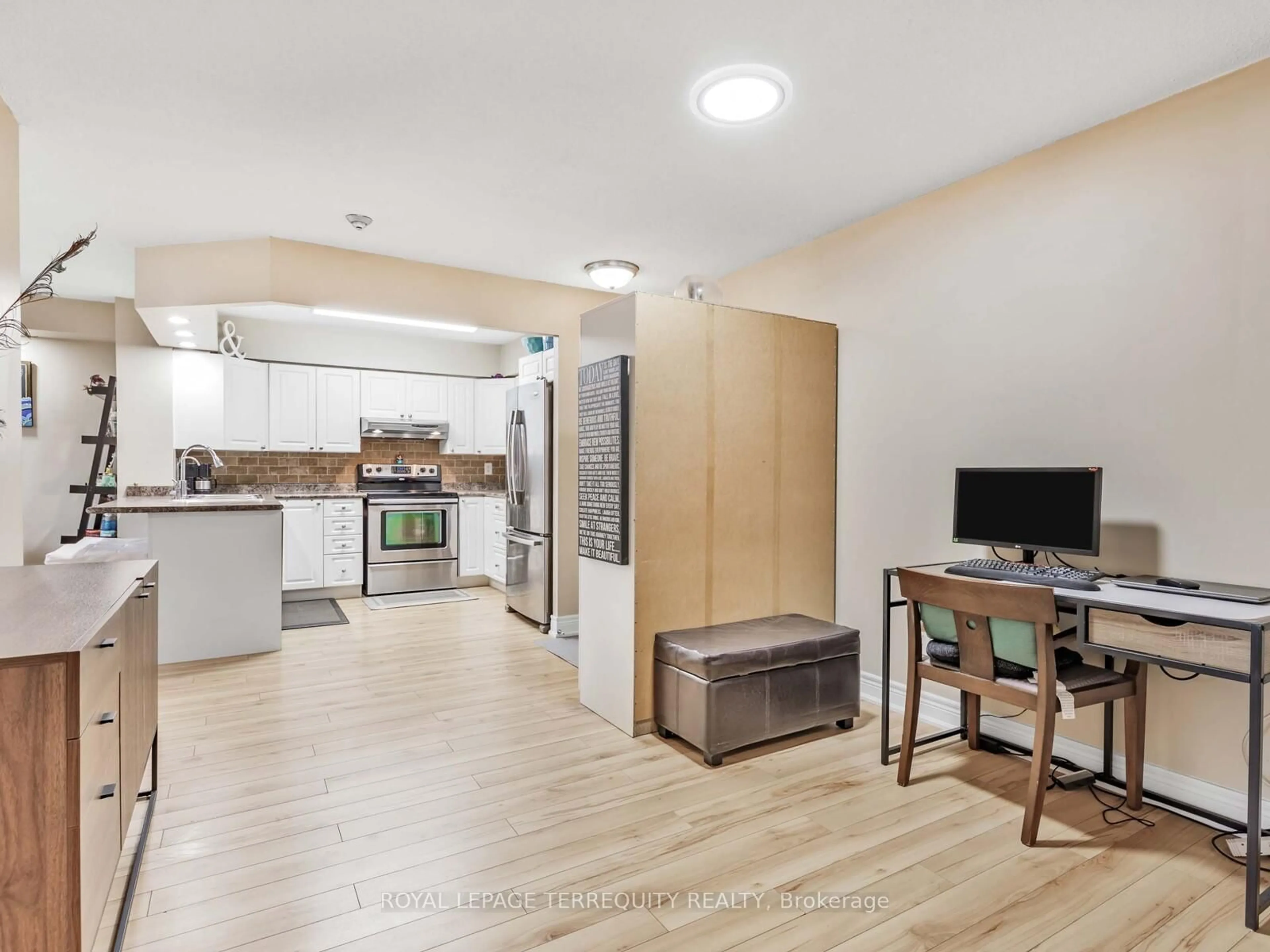 Open concept kitchen, wood/laminate floor for 326 Major Mackenzie Dr #203, Richmond Hill Ontario L4C 8T4