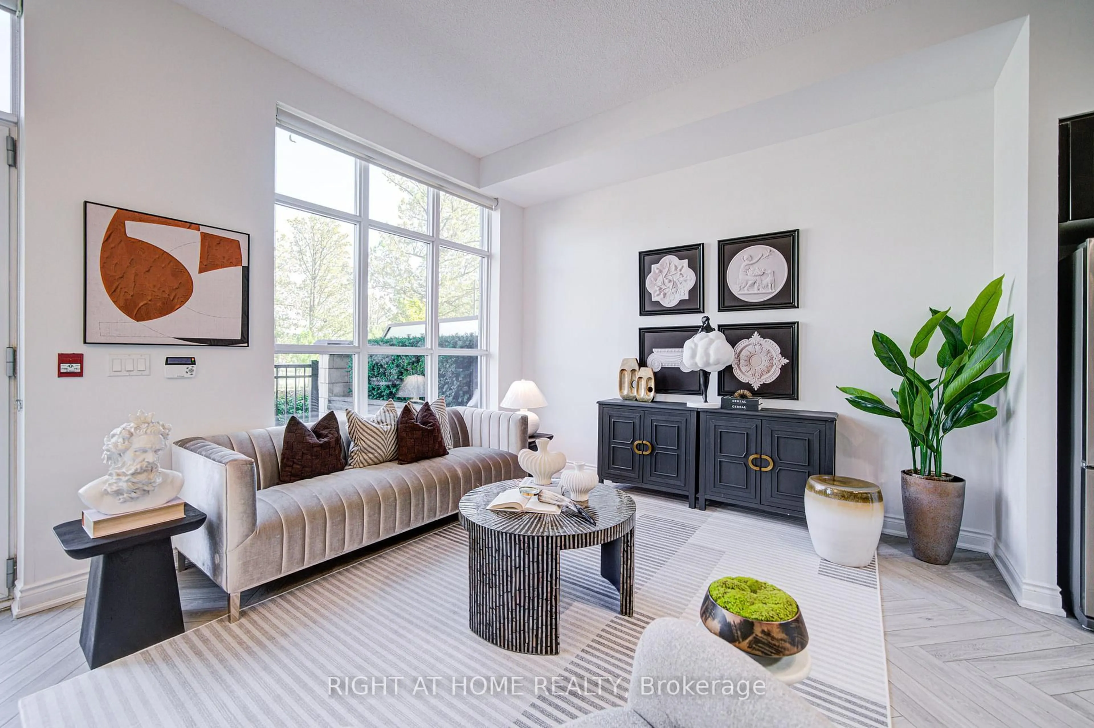 Living room with furniture, unknown for 38 Cedarland Dr #C103, Markham Ontario L6G 0G7