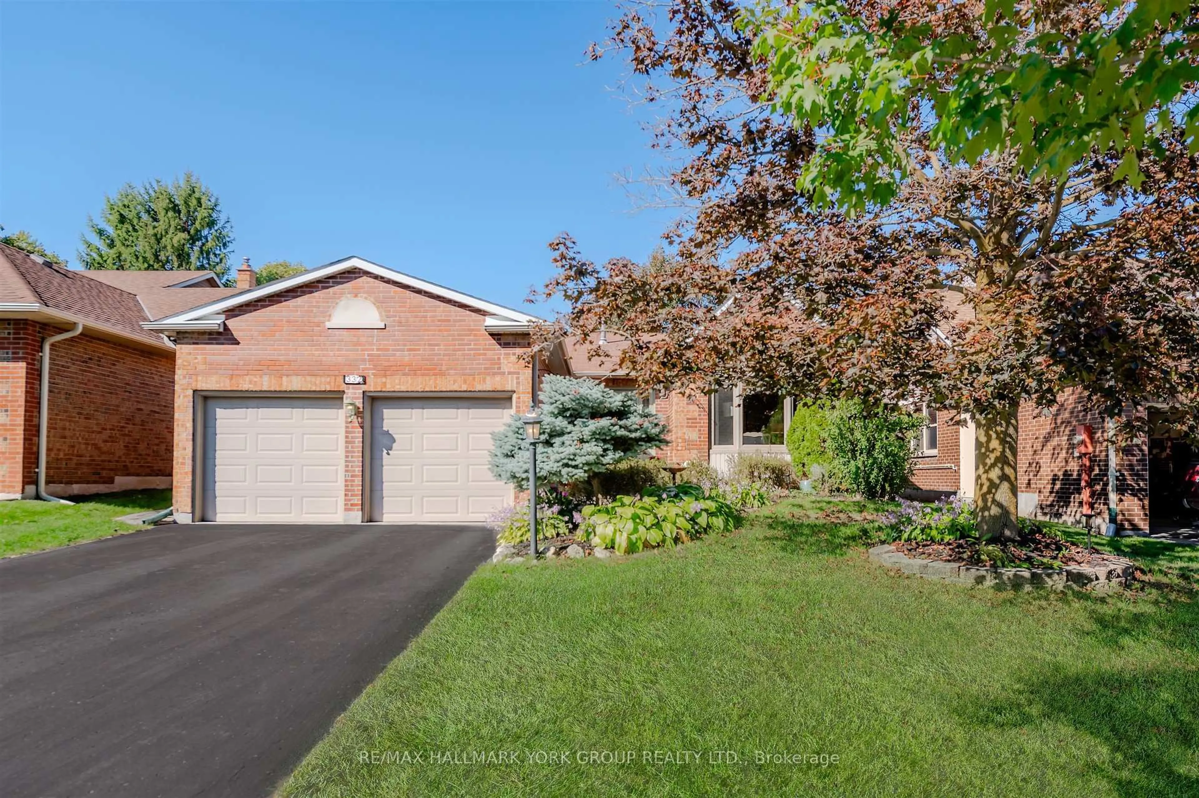 Home with brick exterior material, street for 332 John Bowser Cres, Newmarket Ontario L3Y 7P2