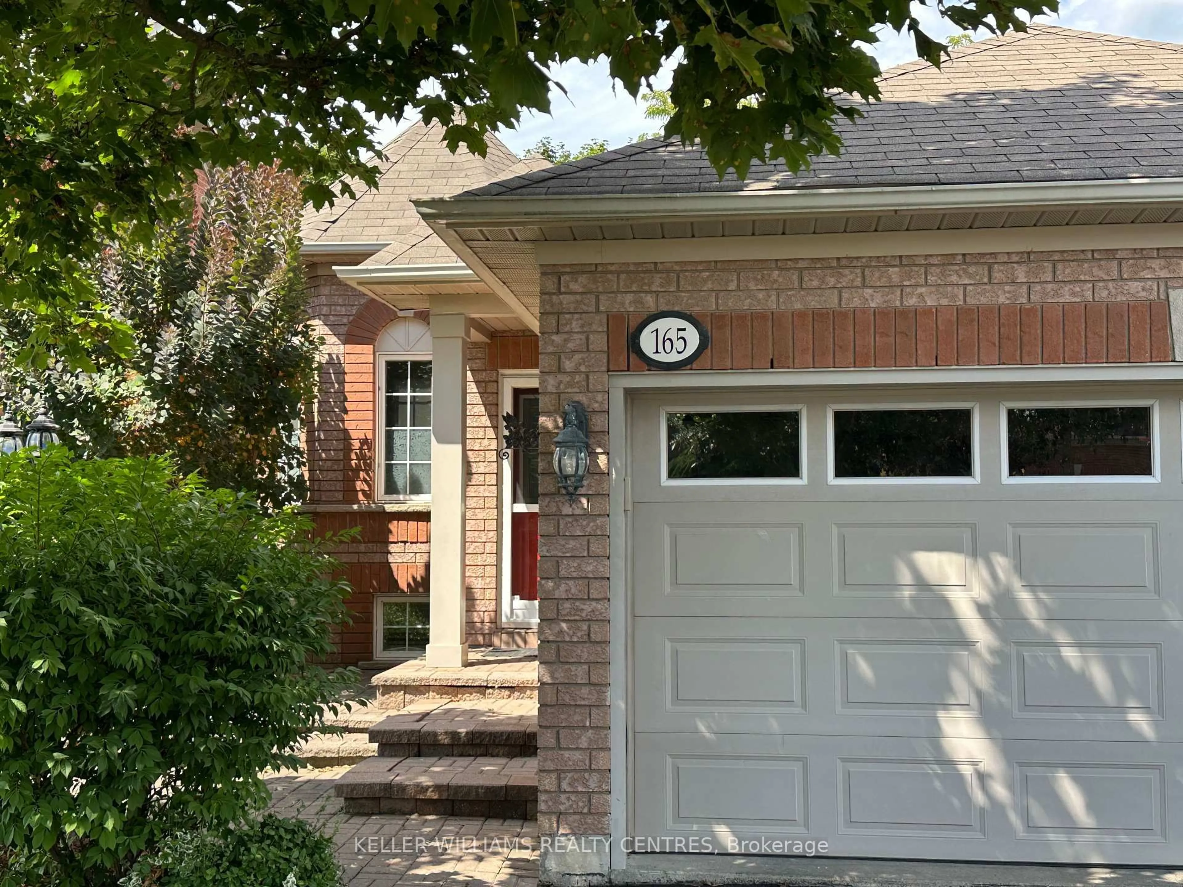 Home with brick exterior material, street for 165 Clearmeadow Blvd, Newmarket Ontario L3X 2E4