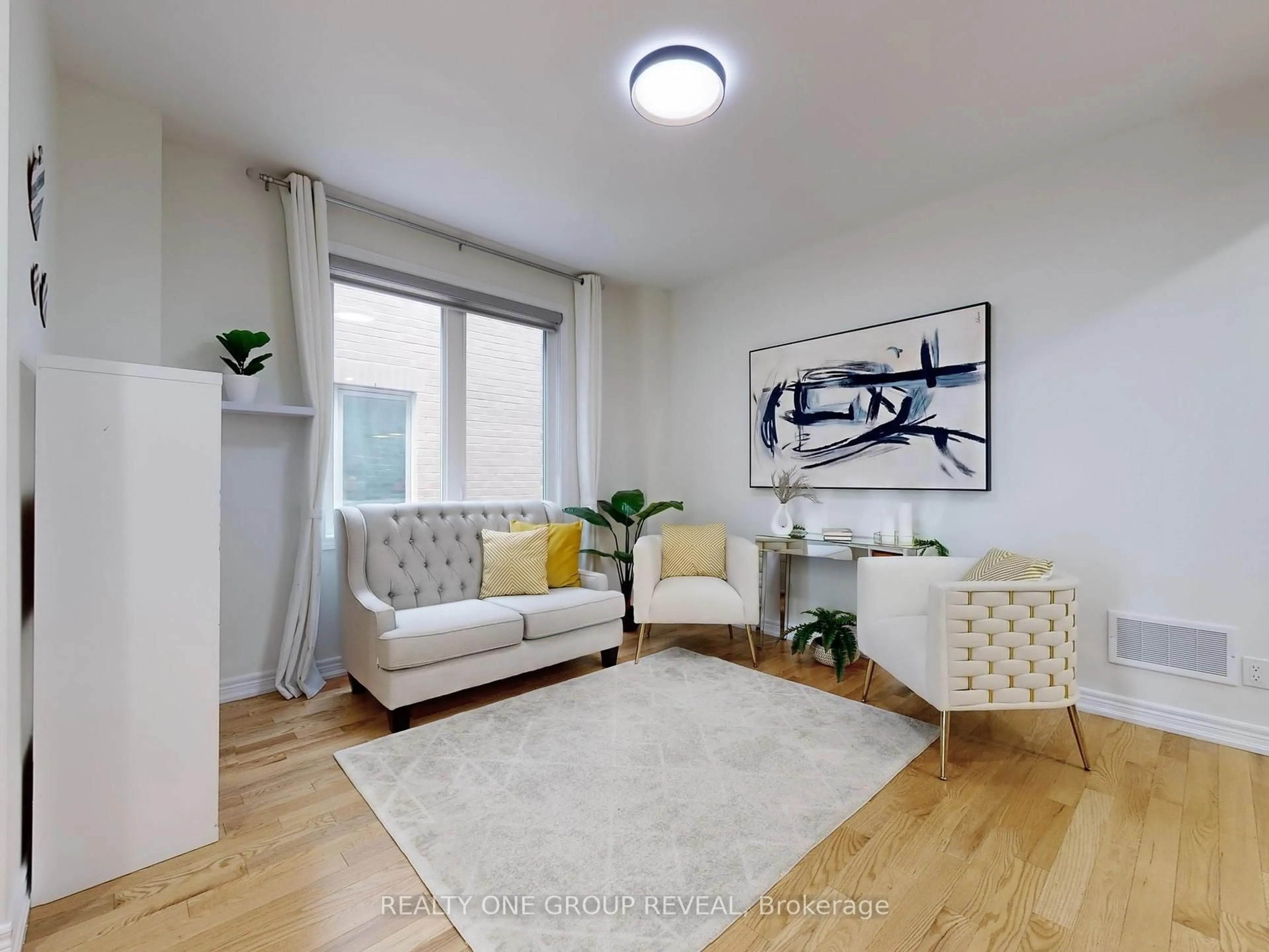 Living room with furniture, wood/laminate floor for 58 Busato Dr, Whitchurch-Stouffville Ontario L4A 4V4
