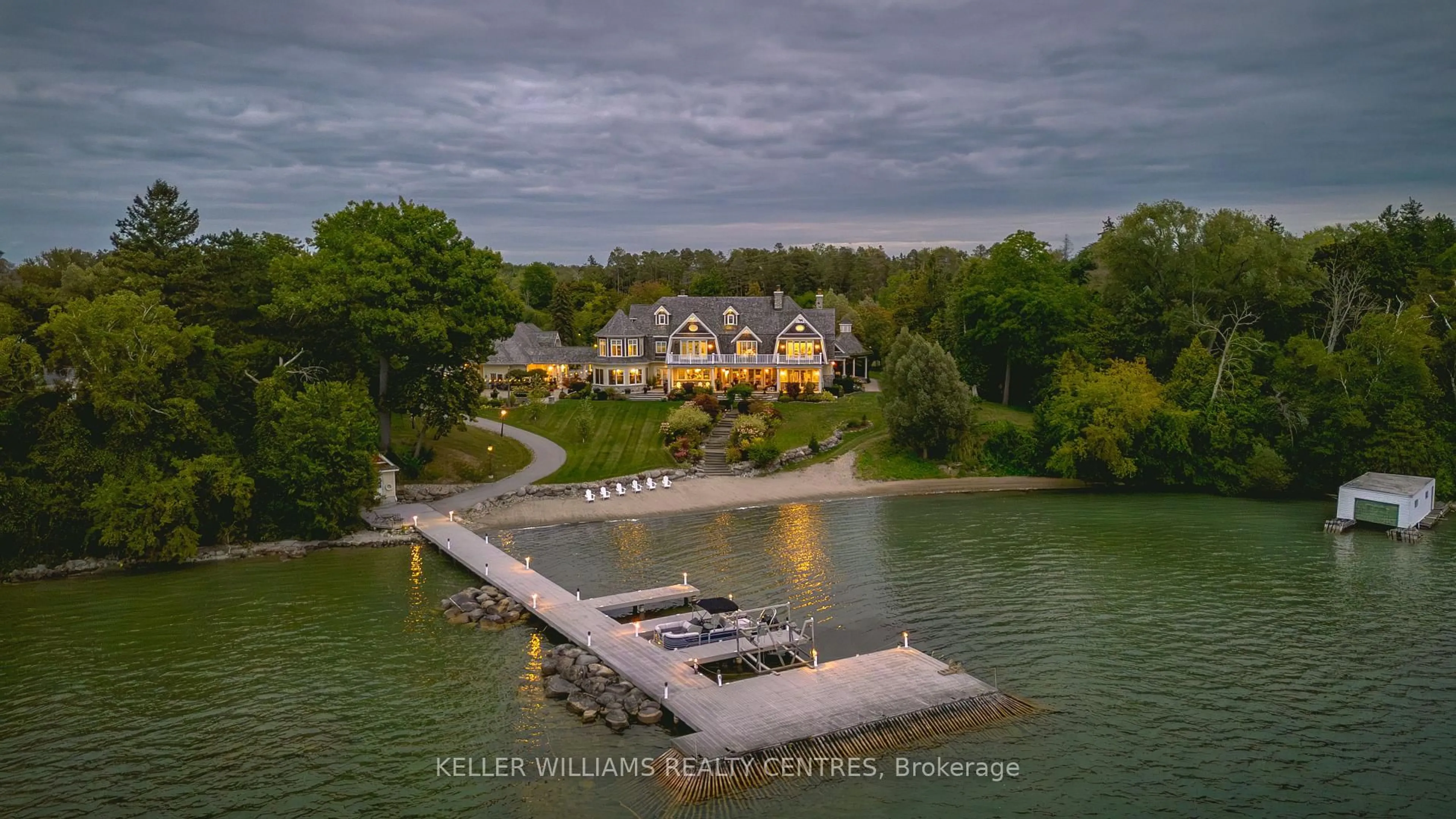A pic from outside/outdoor area/front of a property/back of a property/a pic from drone, water/lake/river/ocean view for 736 Lake Dr, Georgina Ontario L4P 3C8
