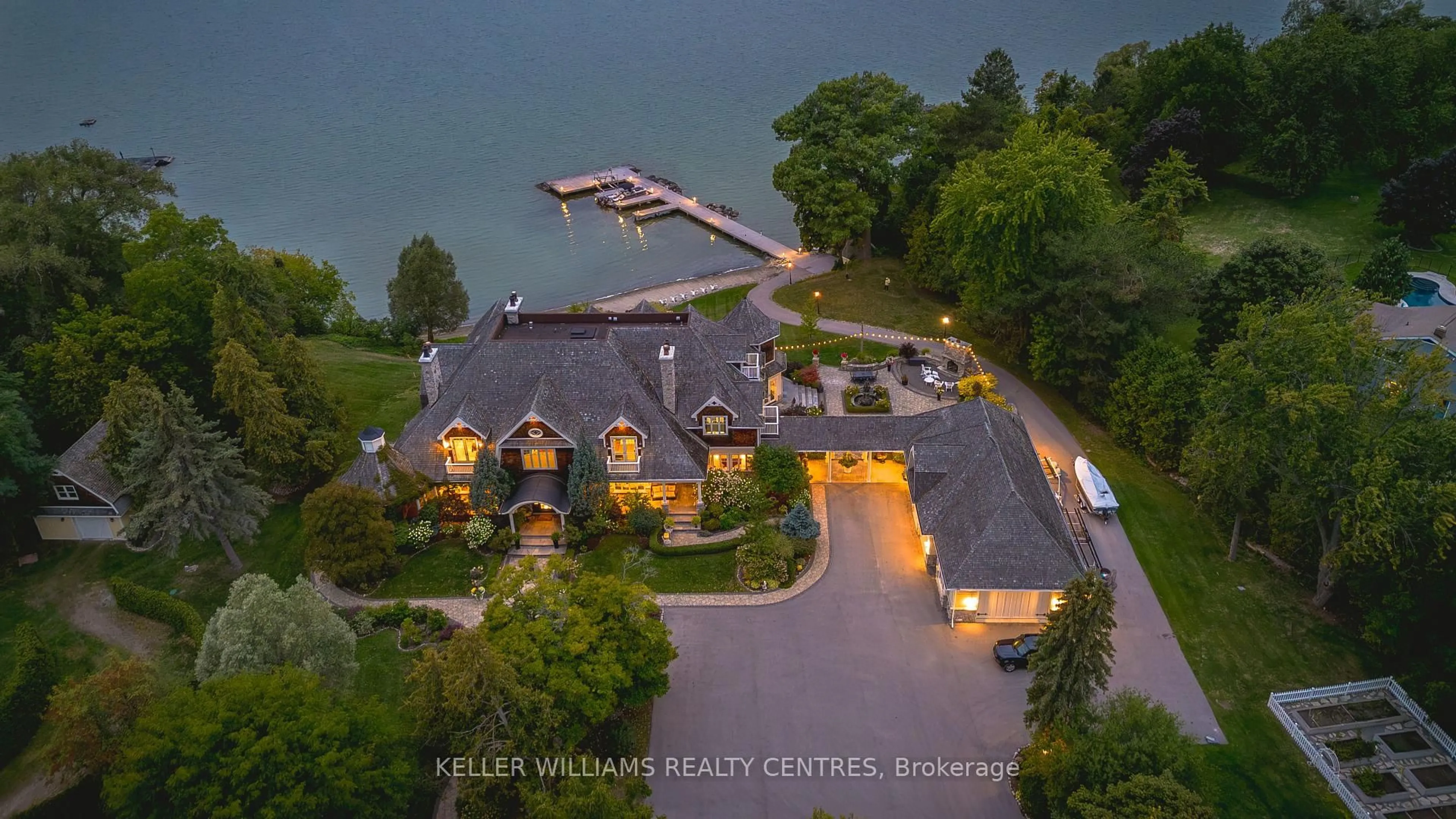 A pic from outside/outdoor area/front of a property/back of a property/a pic from drone, water/lake/river/ocean view for 736 Lake Dr, Georgina Ontario L4P 3C8