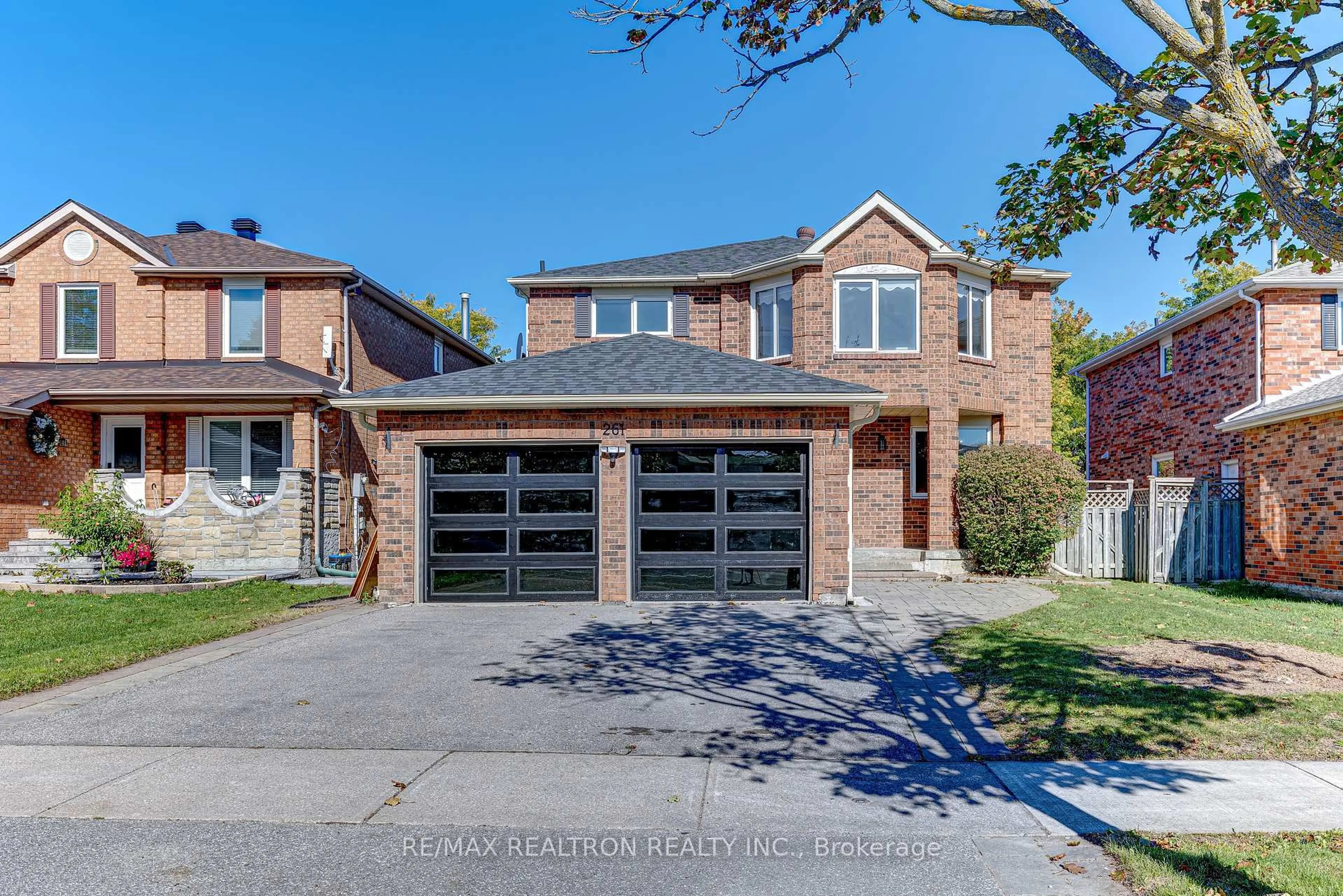 Home with brick exterior material, street for 261 Hollingham Rd, Markham Ontario L3R 8J7