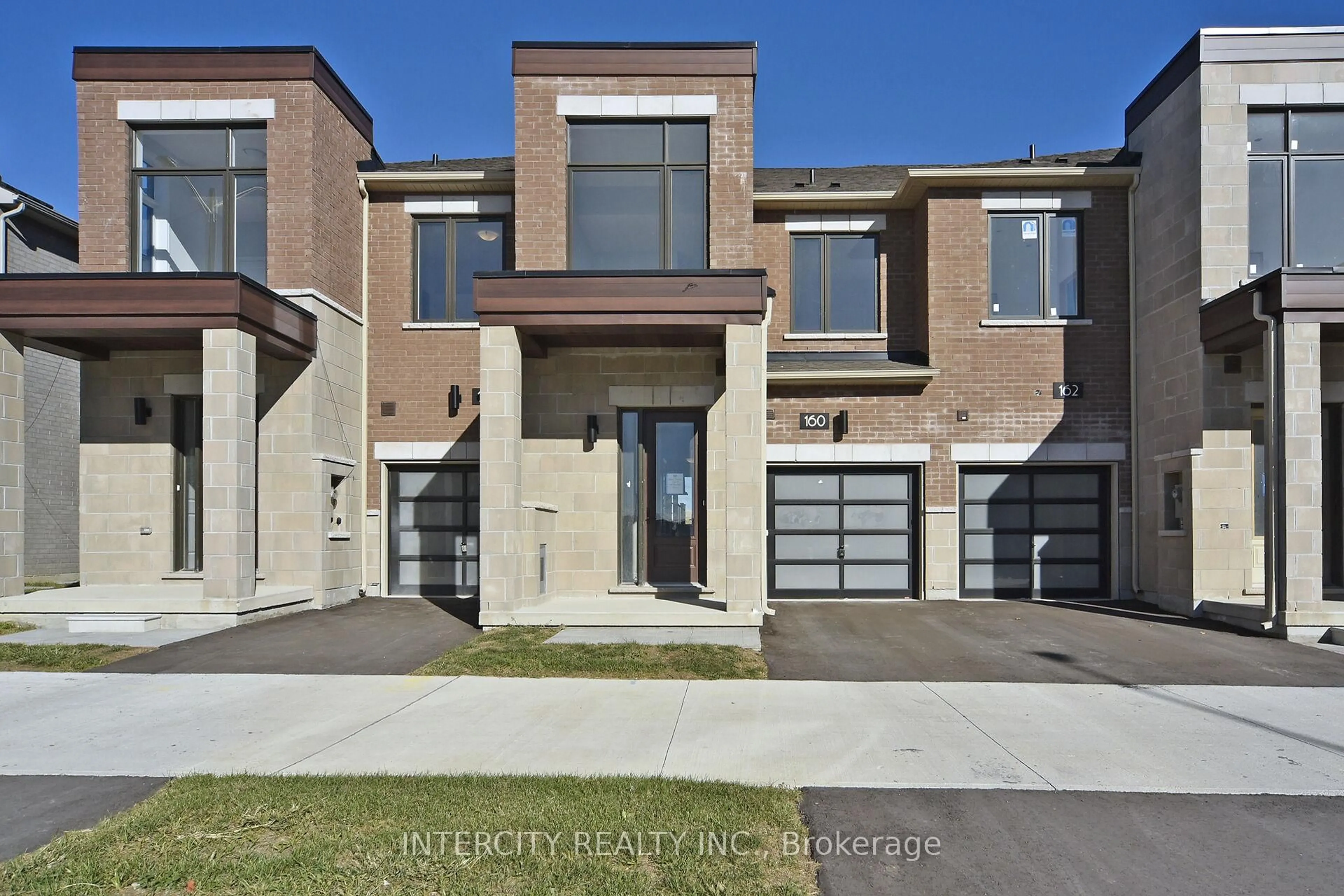 Home with brick exterior material, street for 160 Mumbai Dr, Markham Ontario L3S 3K5