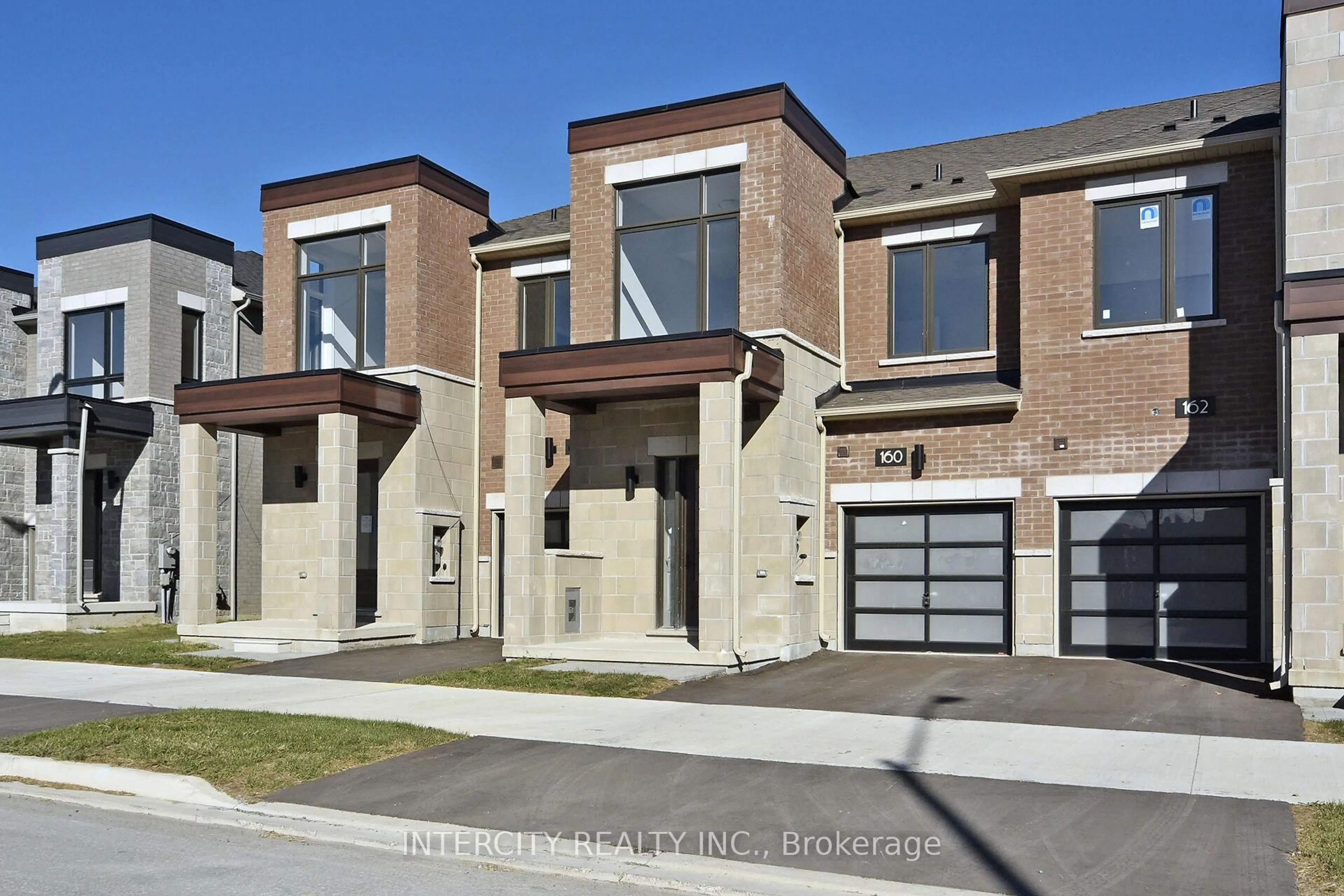 Home with brick exterior material, street for 160 Mumbai Dr, Markham Ontario L3S 3K5