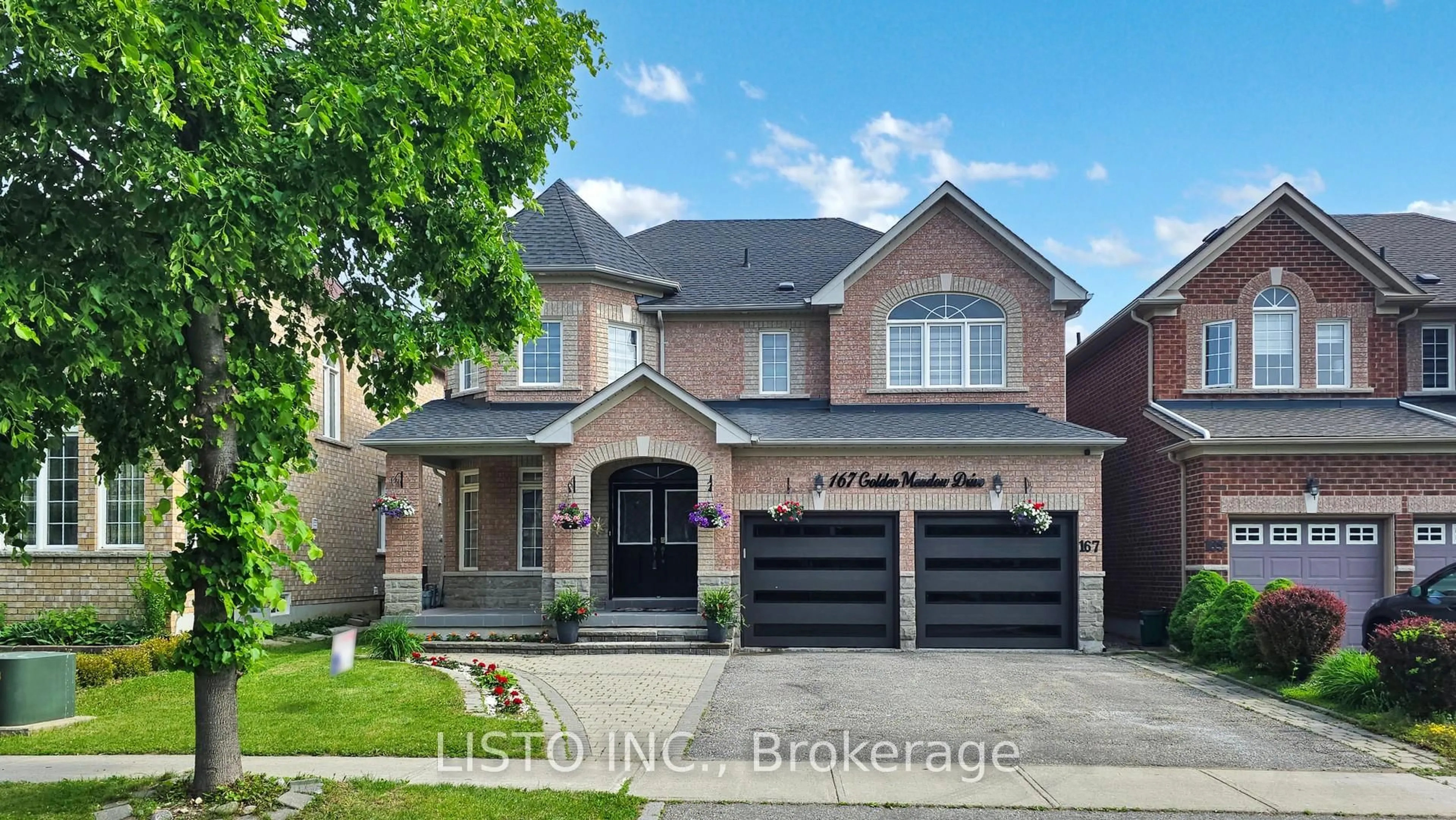 Home with brick exterior material, street for 167 Golden Meadow Dr, Markham Ontario L6E 1E2