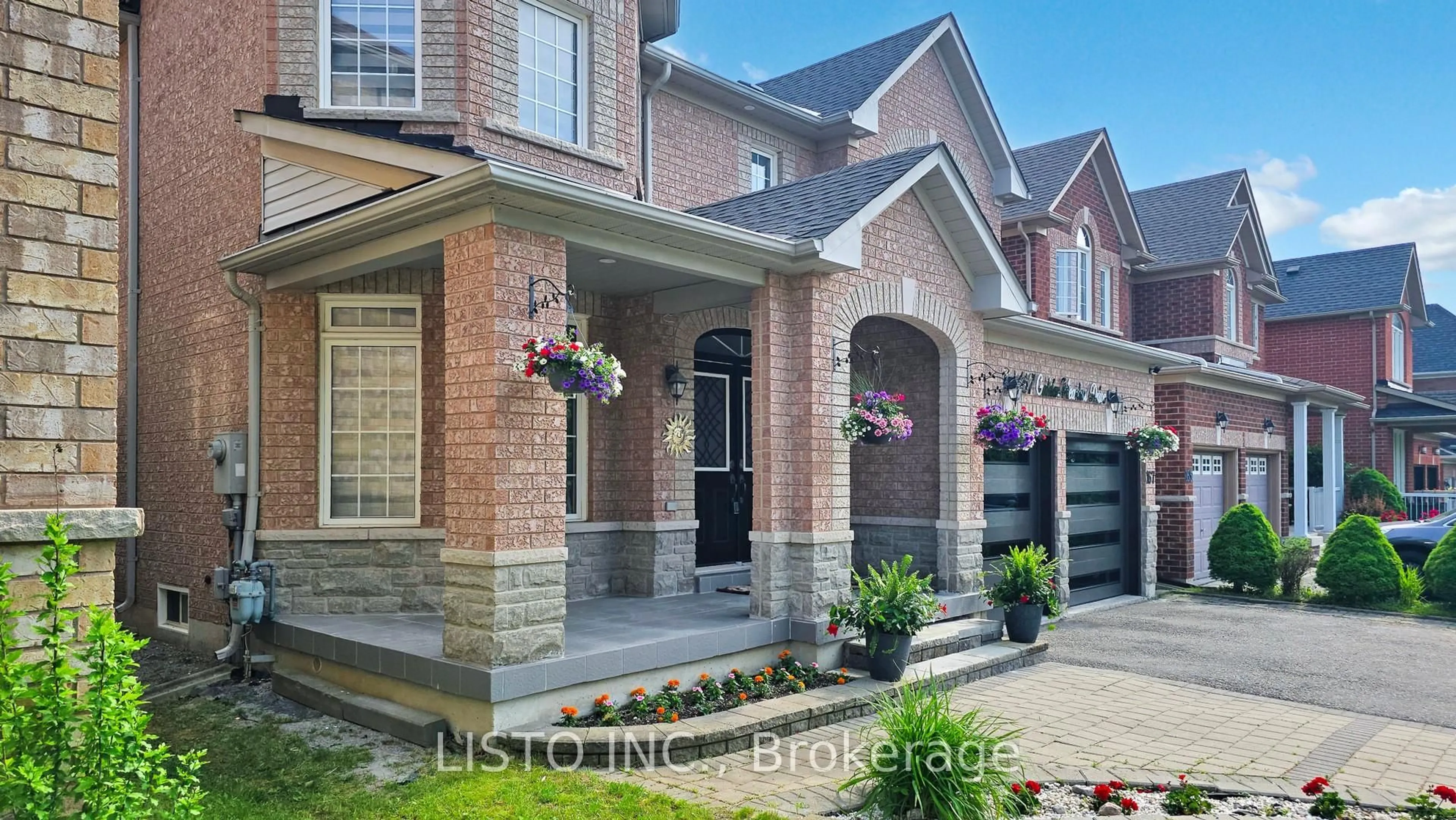 Home with brick exterior material, street for 167 Golden Meadow Dr, Markham Ontario L6E 1E2