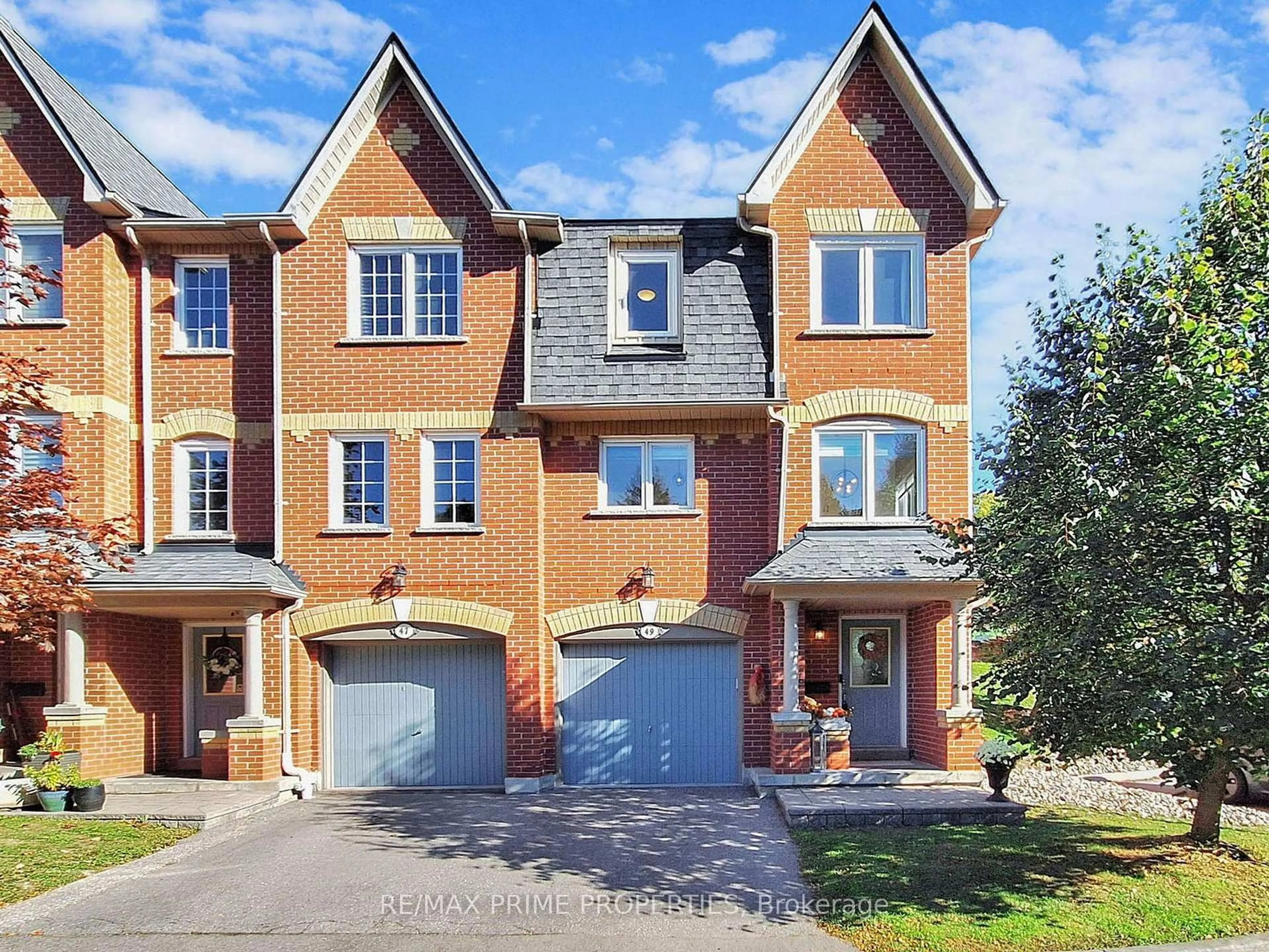 Home with brick exterior material, street for 49 Marmill Way, Markham Ontario L3P 7V6