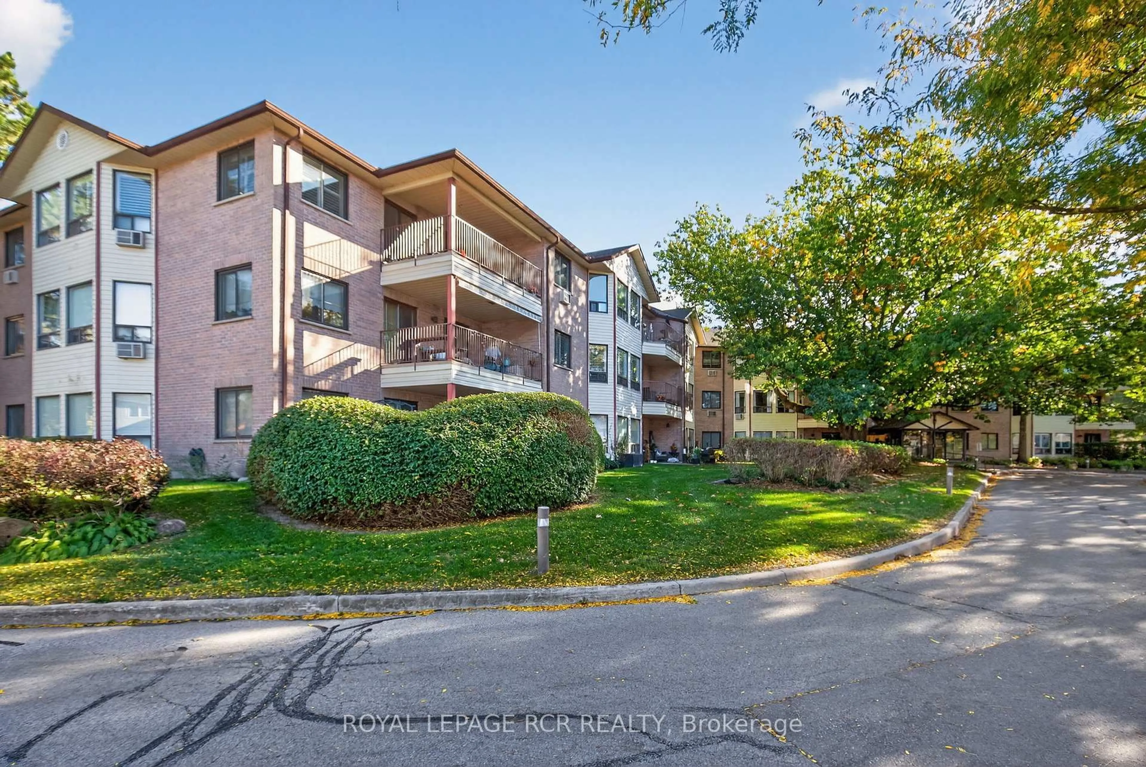 A pic from outside/outdoor area/front of a property/back of a property/a pic from drone, water/lake/river/ocean view for 111 Grew Blvd #311, Georgina Ontario L0E 1L0