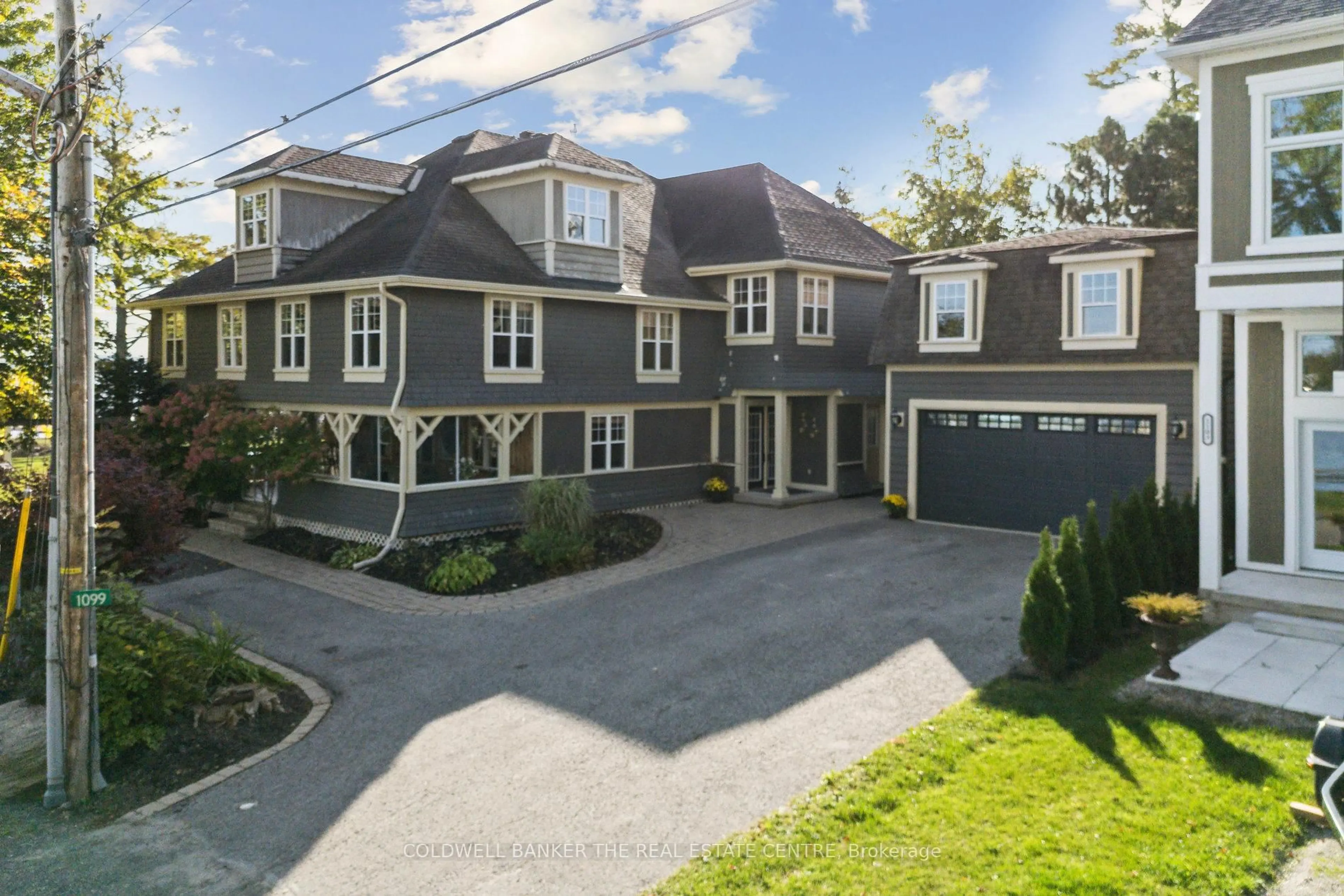 A pic from outside/outdoor area/front of a property/back of a property/a pic from drone, street for 1099 Stoney Point Rd, Innisfil Ontario L0L 1W0