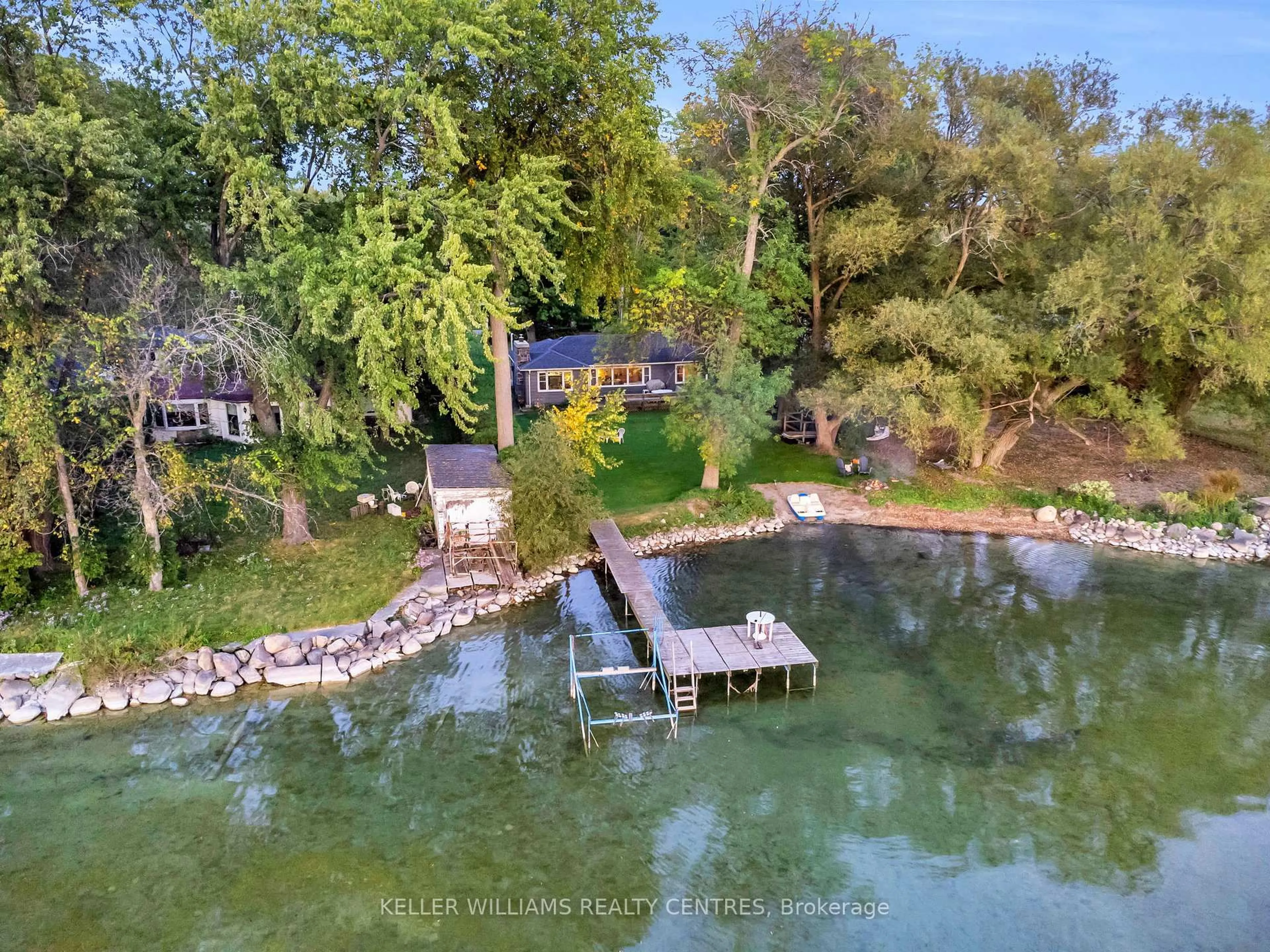A pic from outside/outdoor area/front of a property/back of a property/a pic from drone, water/lake/river/ocean view for 28 McRae Beach Rd, Georgina Ontario L0E 1N0