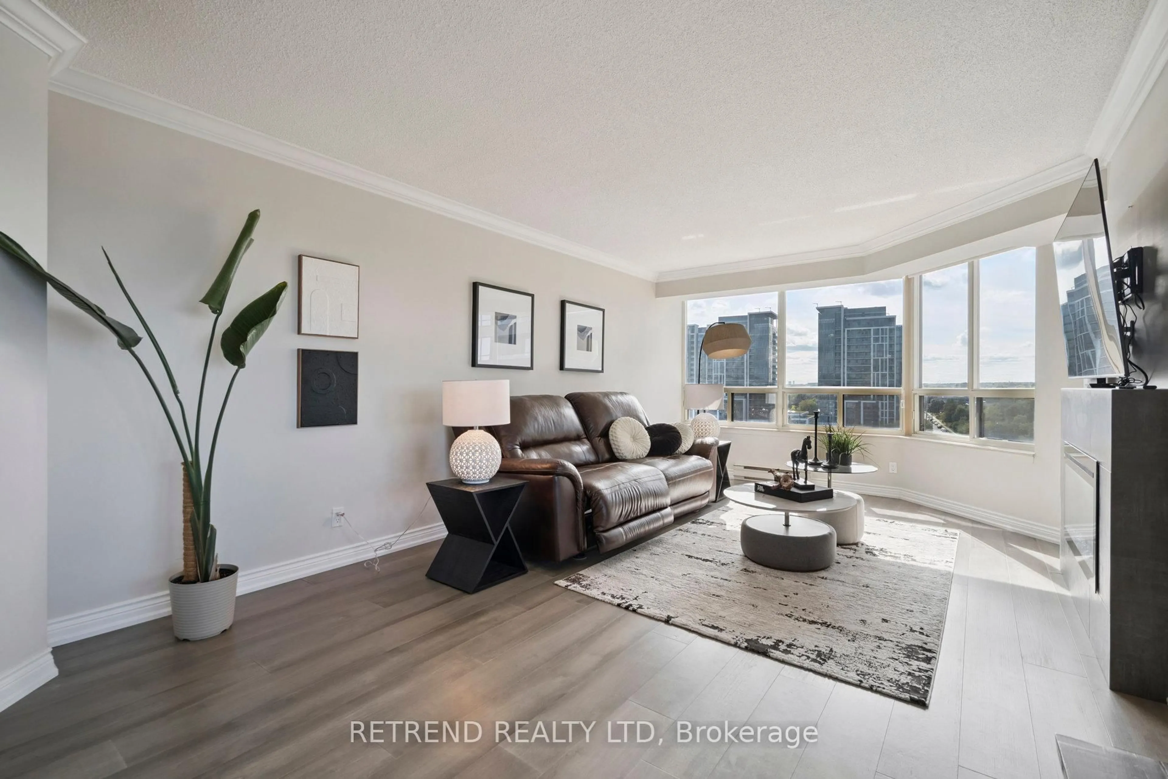 Living room with furniture, wood/laminate floor for 32 Clarissa Dr #826, Richmond Hill Ontario L4C 9R7