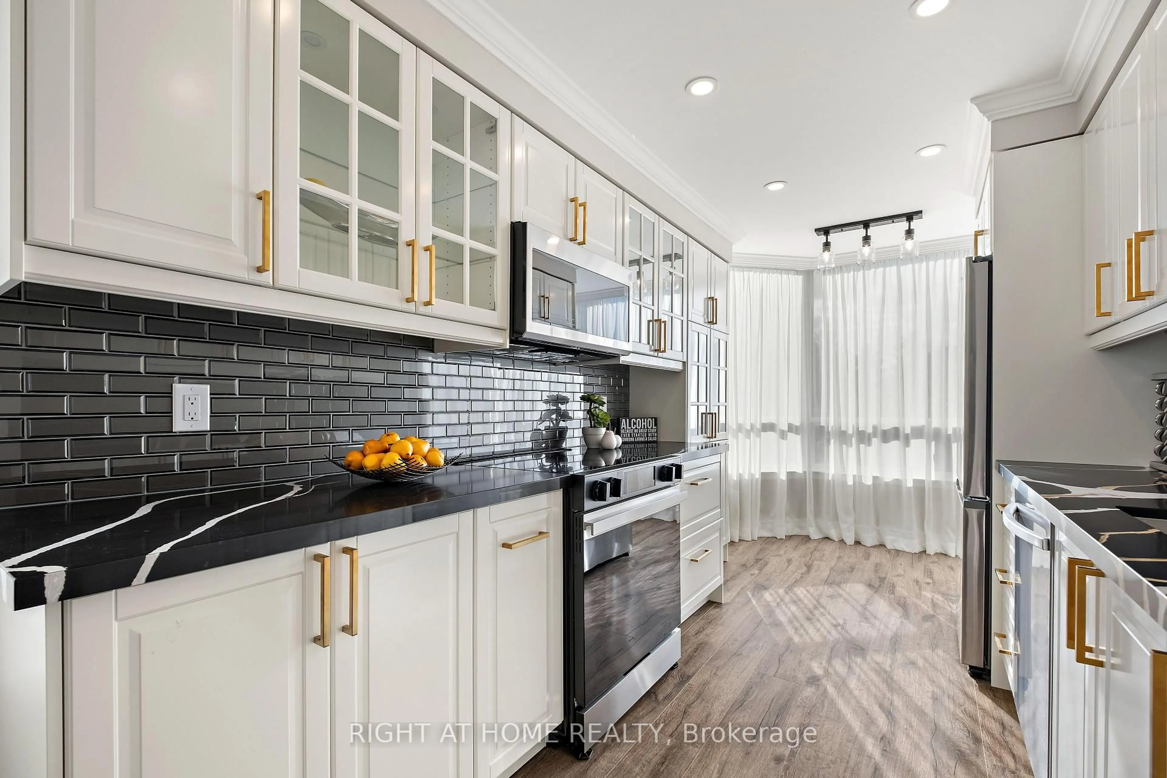 Contemporary kitchen, ceramic/tile floor for 120 Promenade Circ #307, Vaughan Ontario L4J 7W9