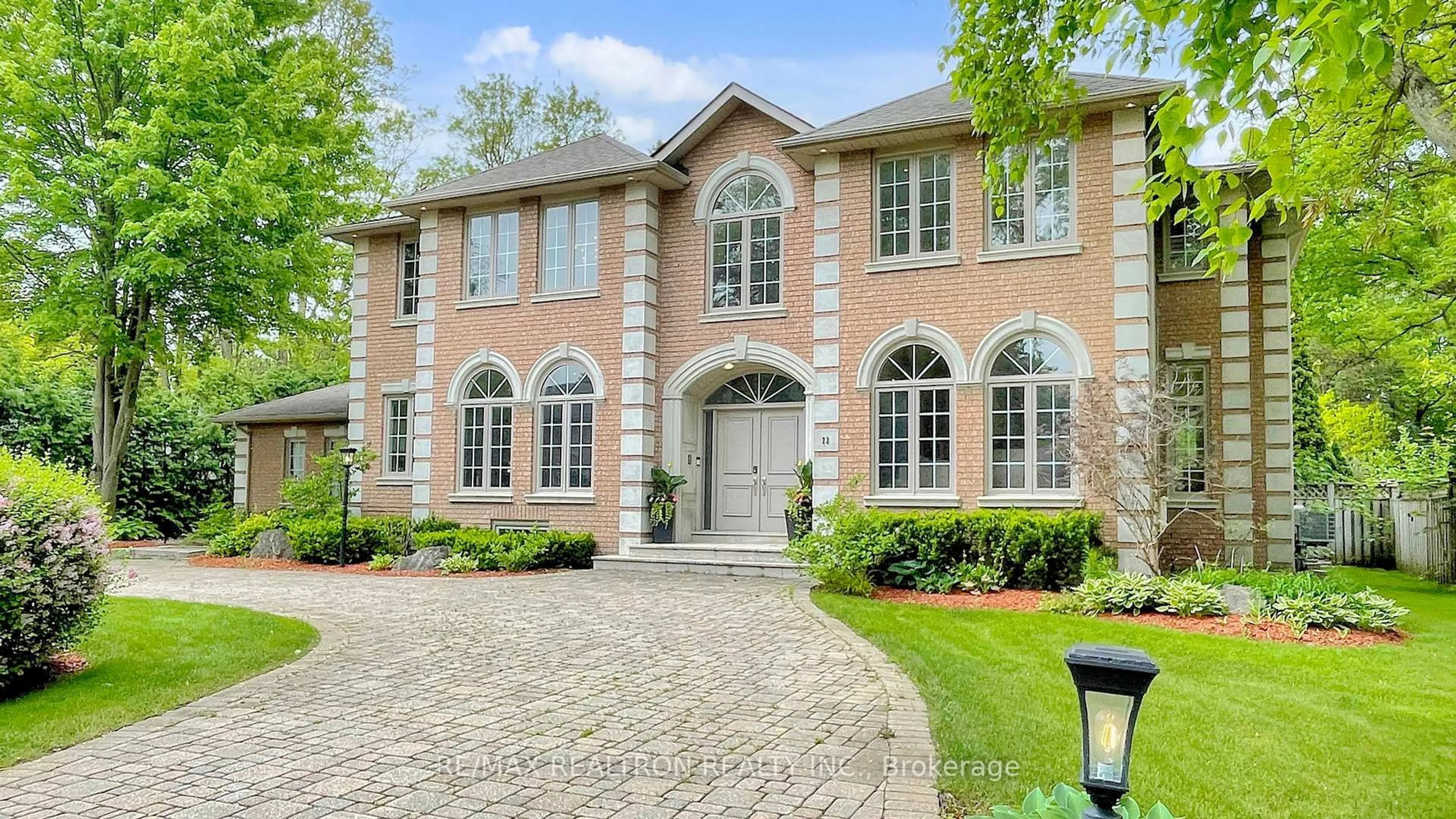 Home with brick exterior material, street for 22 Valloncliffe Rd, Markham Ontario L3T 2W8