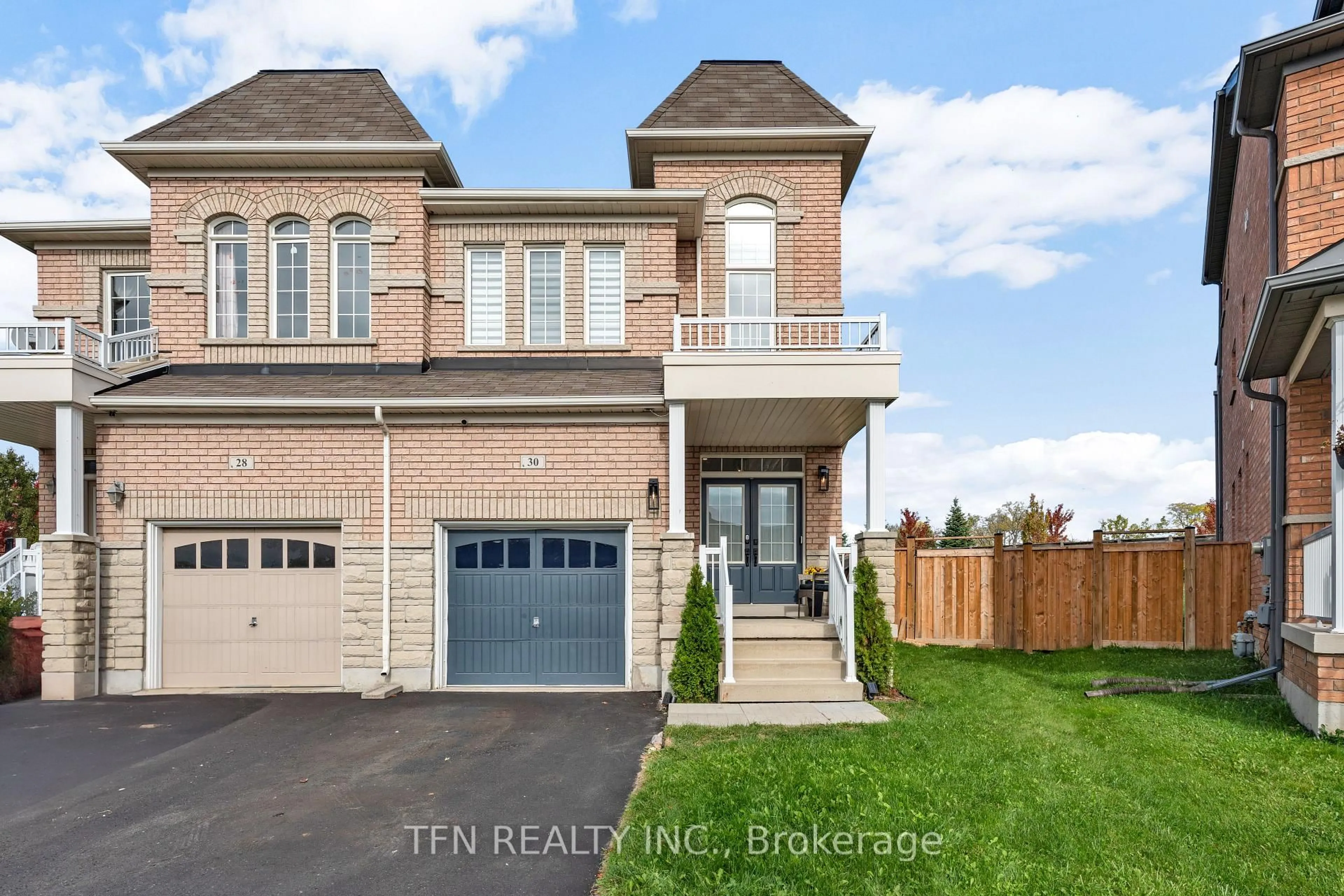 Home with brick exterior material, street for 30 Haskett Dr, Markham Ontario L6B 0S9