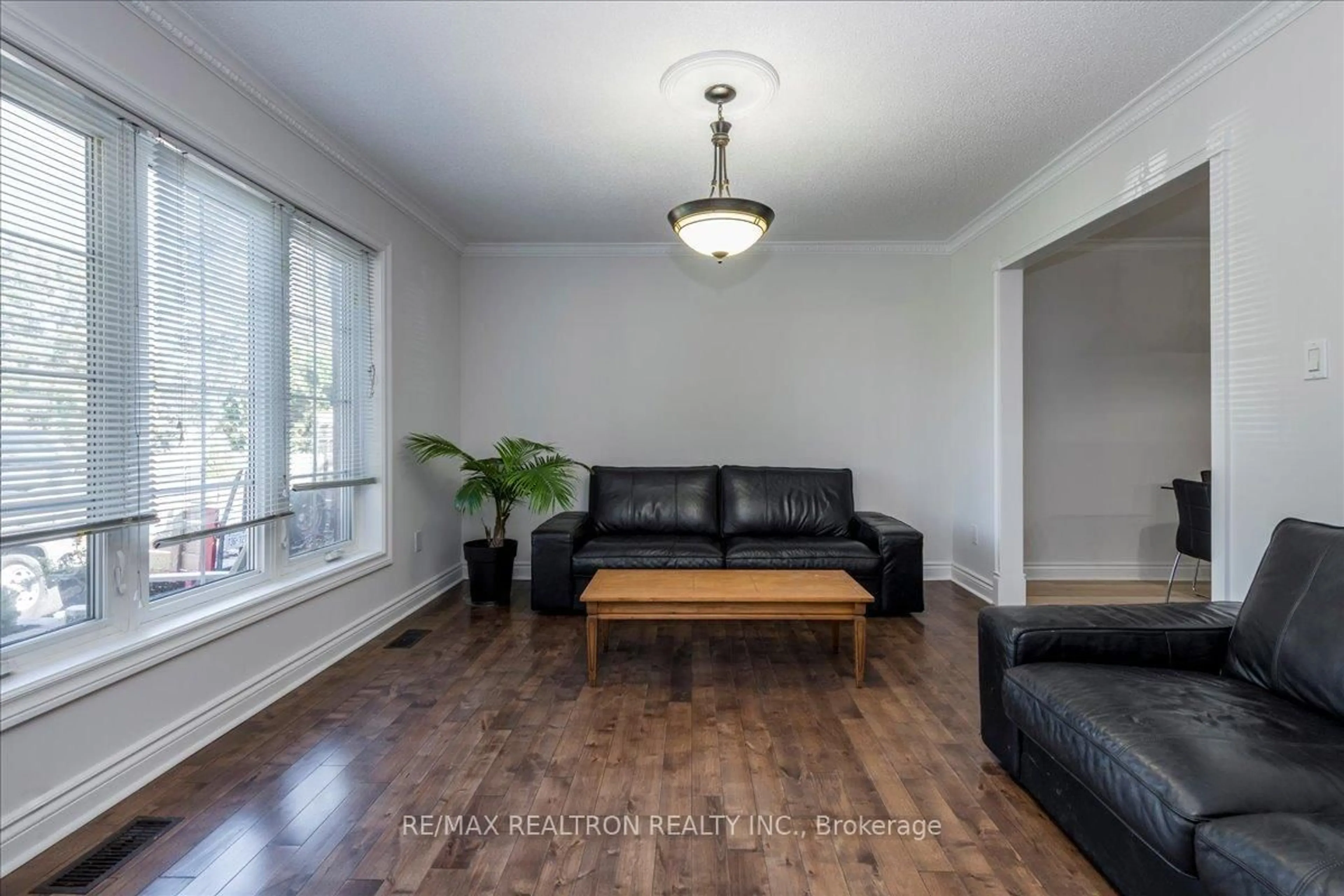 Living room with furniture, wood/laminate floor for 11 Burbank Circ, Adjala-Tosorontio Ontario L0M 1J0