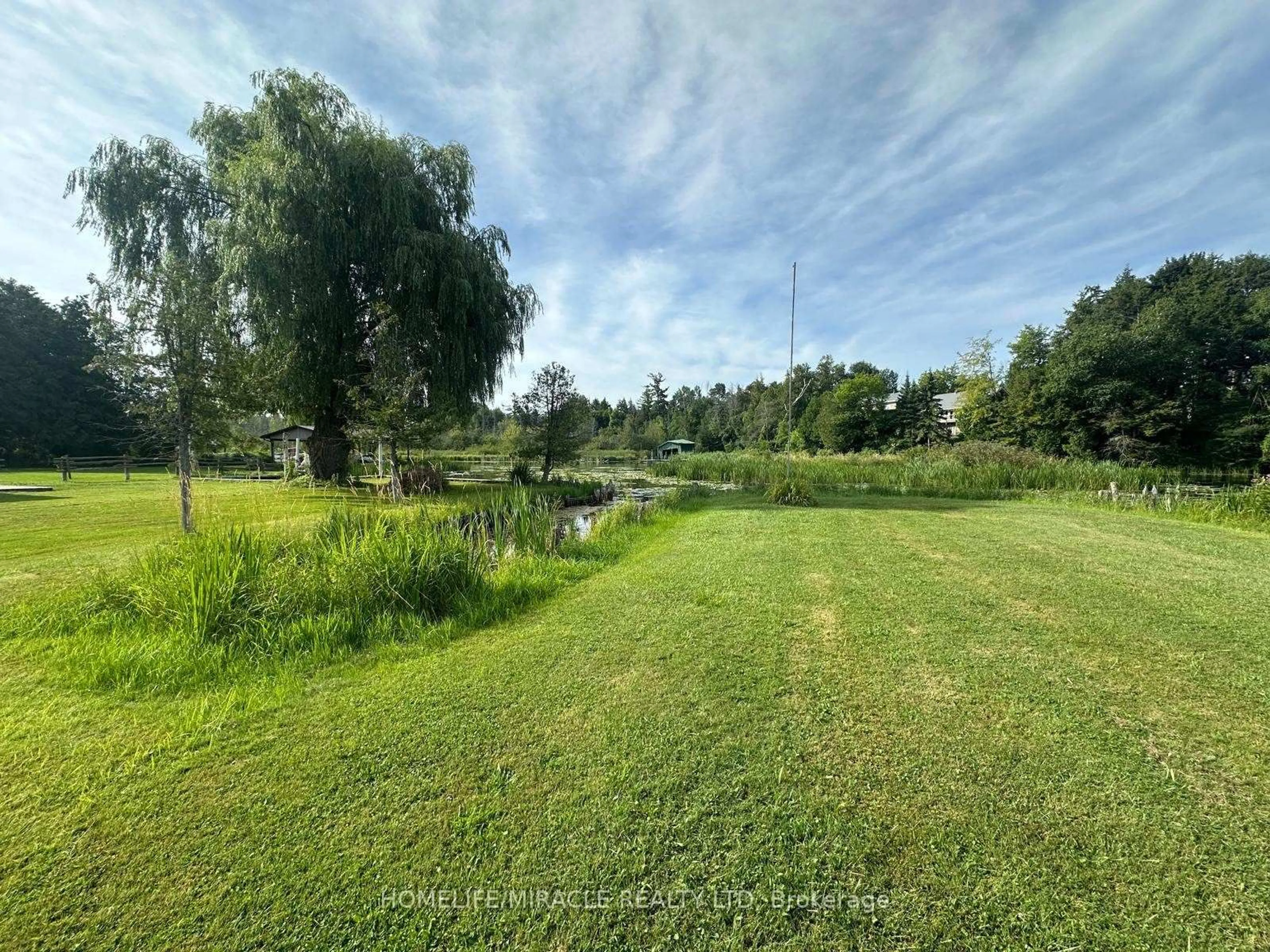 A pic from outside/outdoor area/front of a property/back of a property/a pic from drone, water/lake/river/ocean view for 164 RIVERBANK Dr, Georgina Ontario L0E 1N0