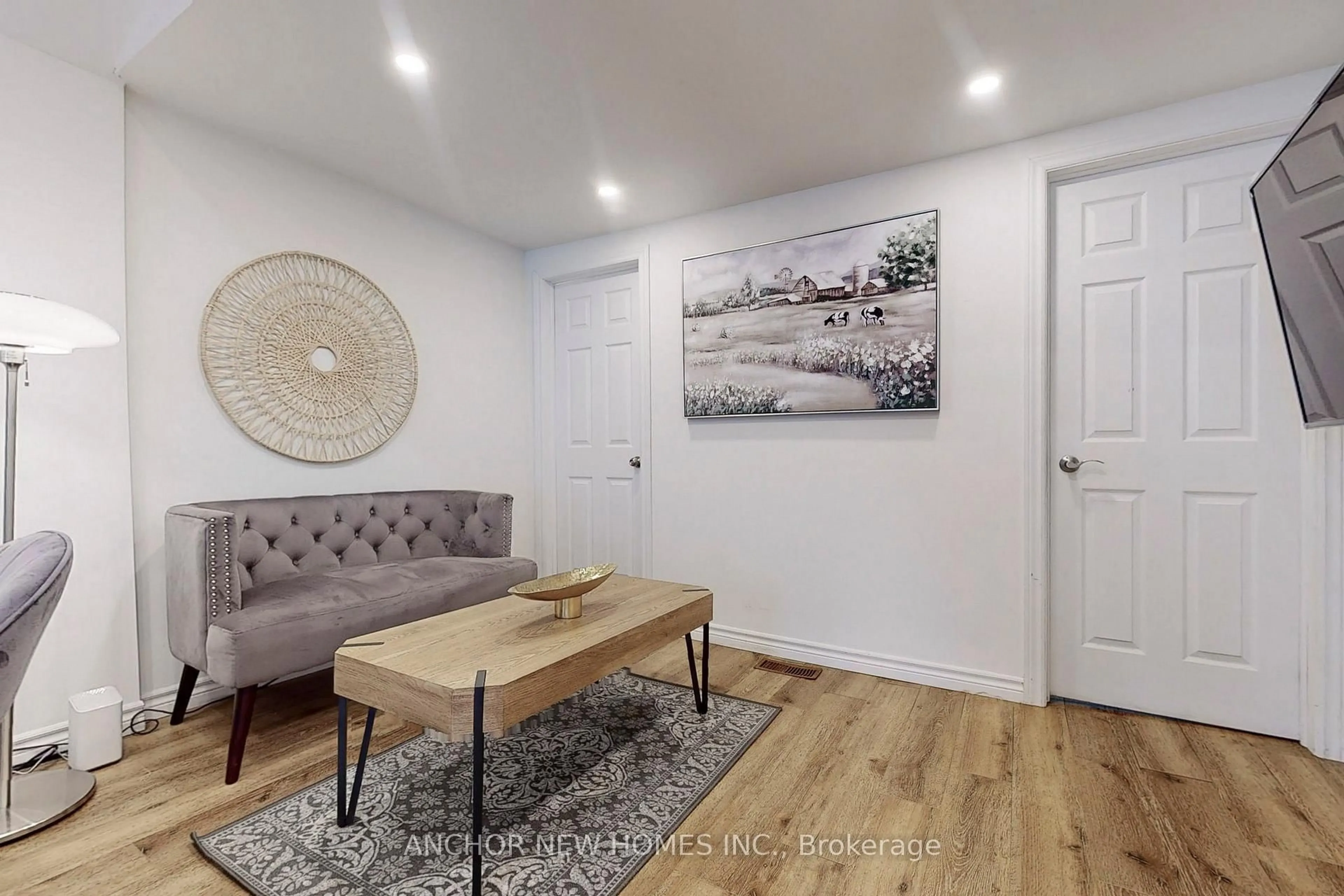 Living room with furniture, wood/laminate floor for 193 Ways Bay Dr, Georgina Ontario L4P 2M6