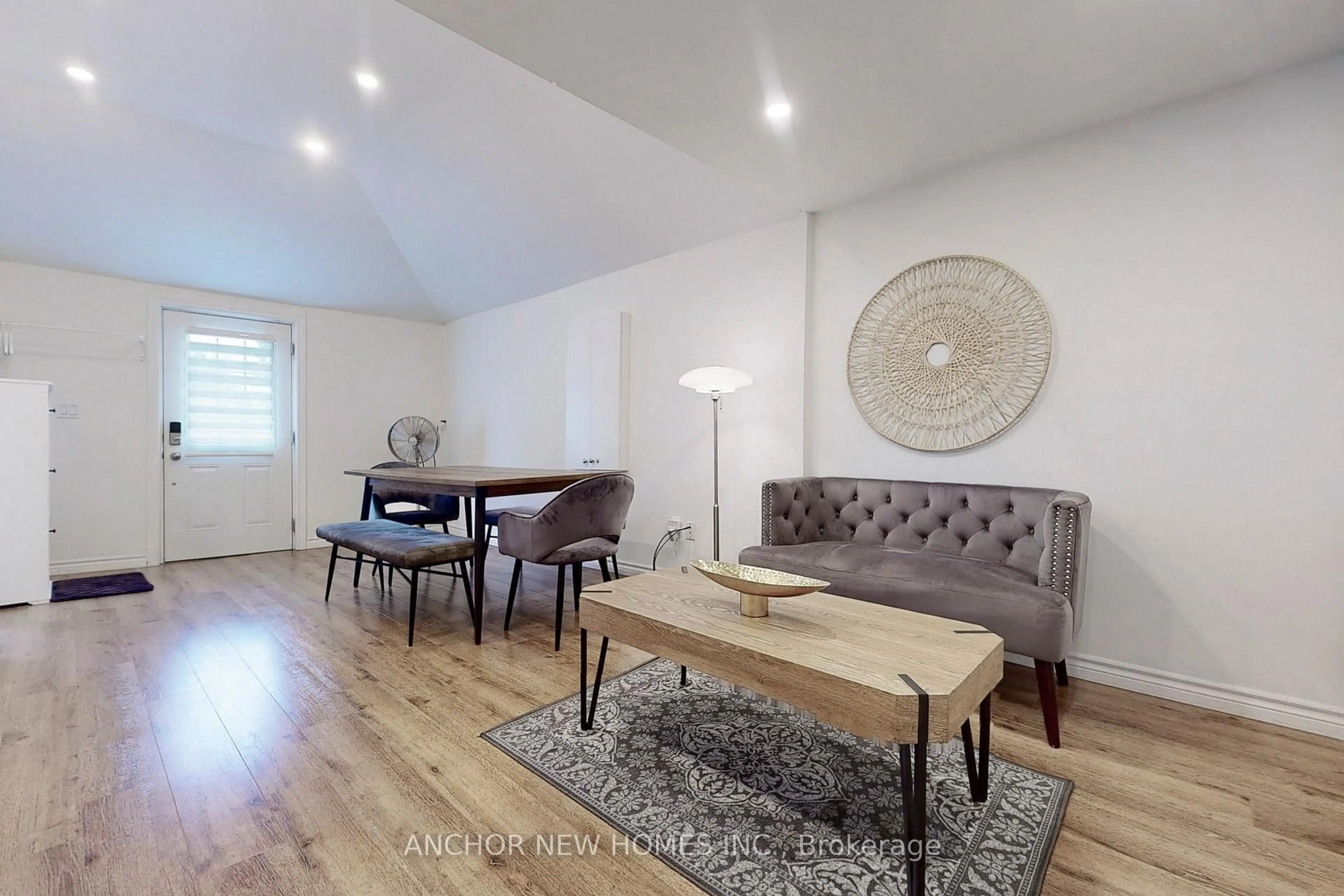 Living room with furniture, wood/laminate floor for 193 Ways Bay Dr, Georgina Ontario L4P 2M6