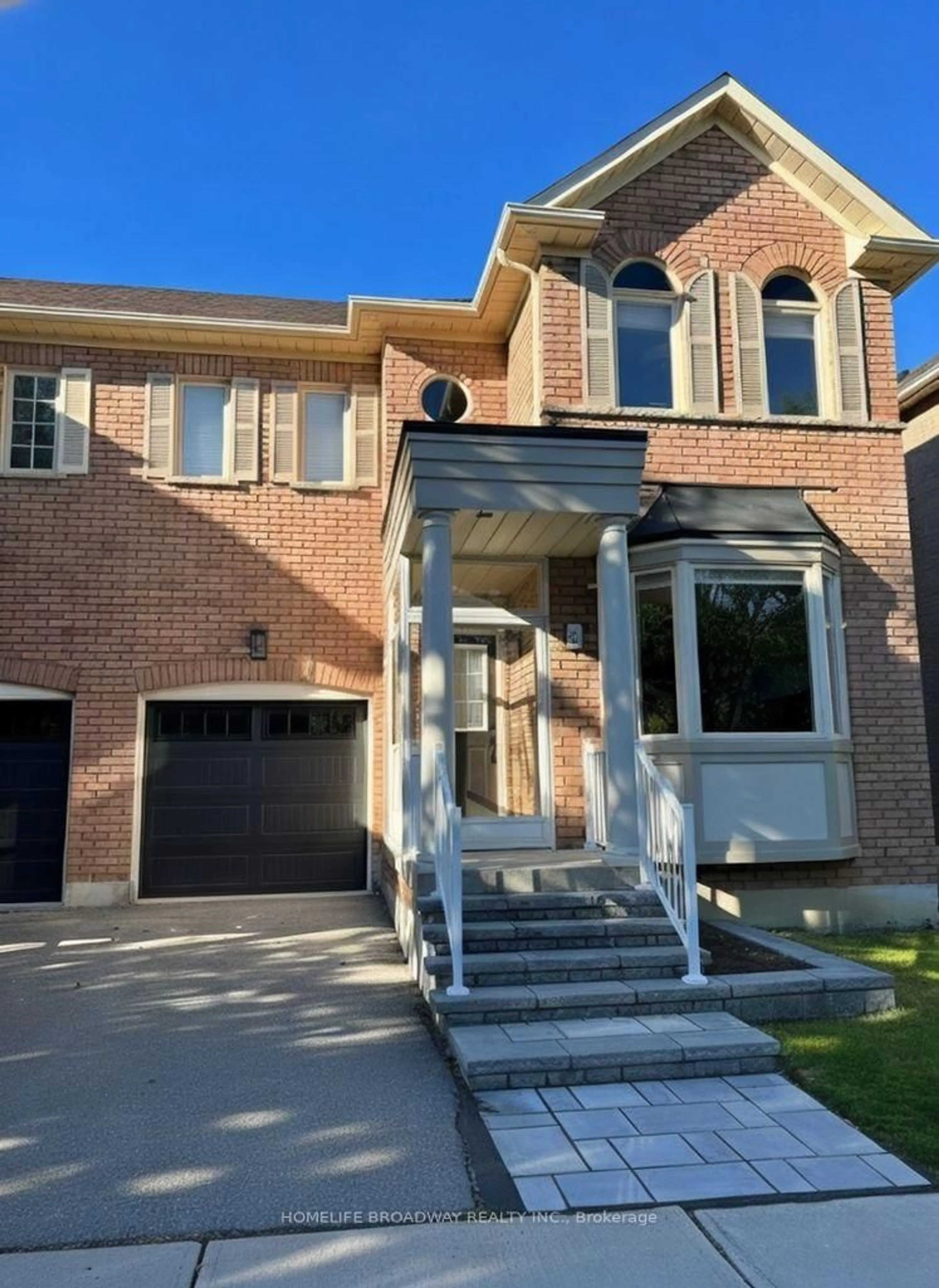 Home with brick exterior material, street for 34 Saintsbury Rd, Markham Ontario L6C 2J1