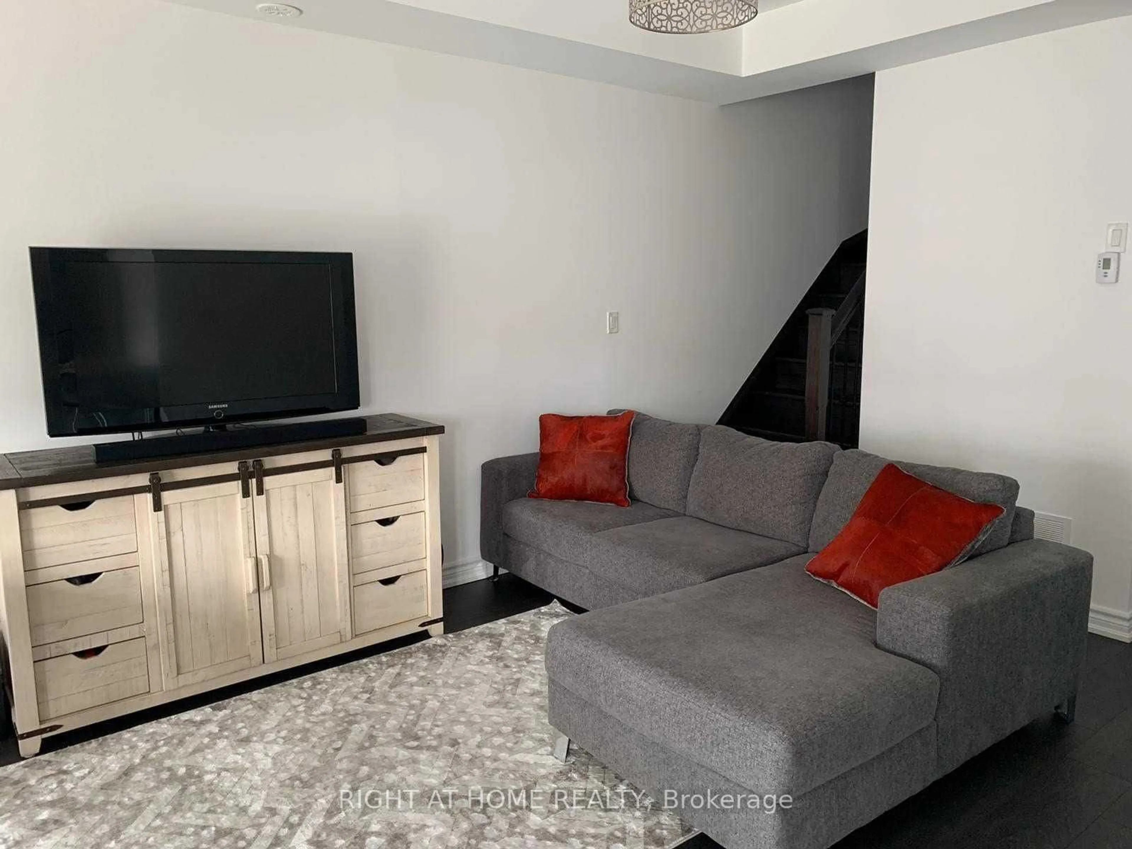 Living room with furniture, unknown for 201 Pine Grove Rd #423, Vaughan Ontario L4L 0H8