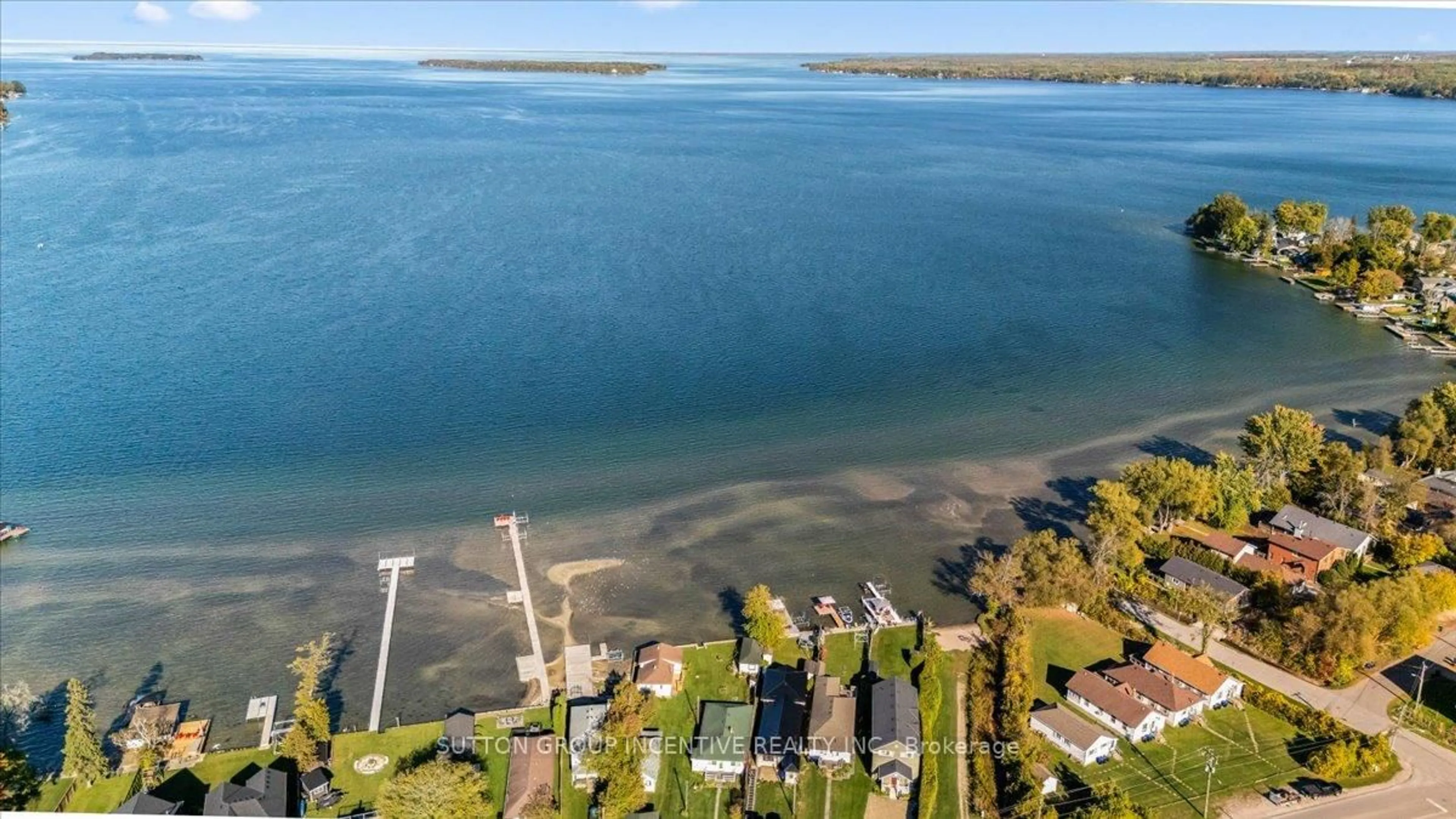 A pic from outside/outdoor area/front of a property/back of a property/a pic from drone, water/lake/river/ocean view for 1226 Maple Rd, Innisfil Ontario L0L 1C0