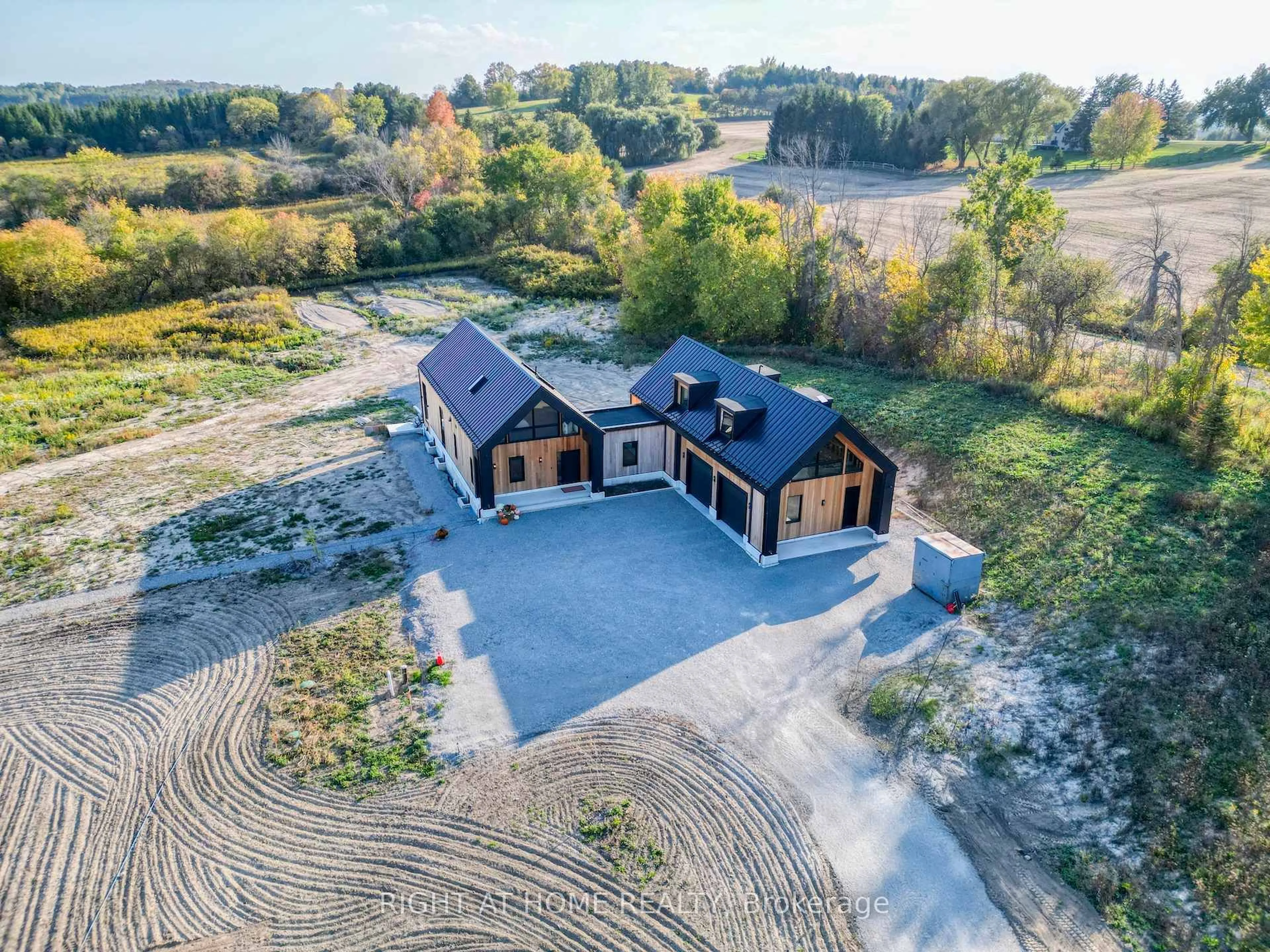 A pic from outside/outdoor area/front of a property/back of a property/a pic from drone, building for 4829 10th Line, New Tecumseth Ontario L0G 1A0