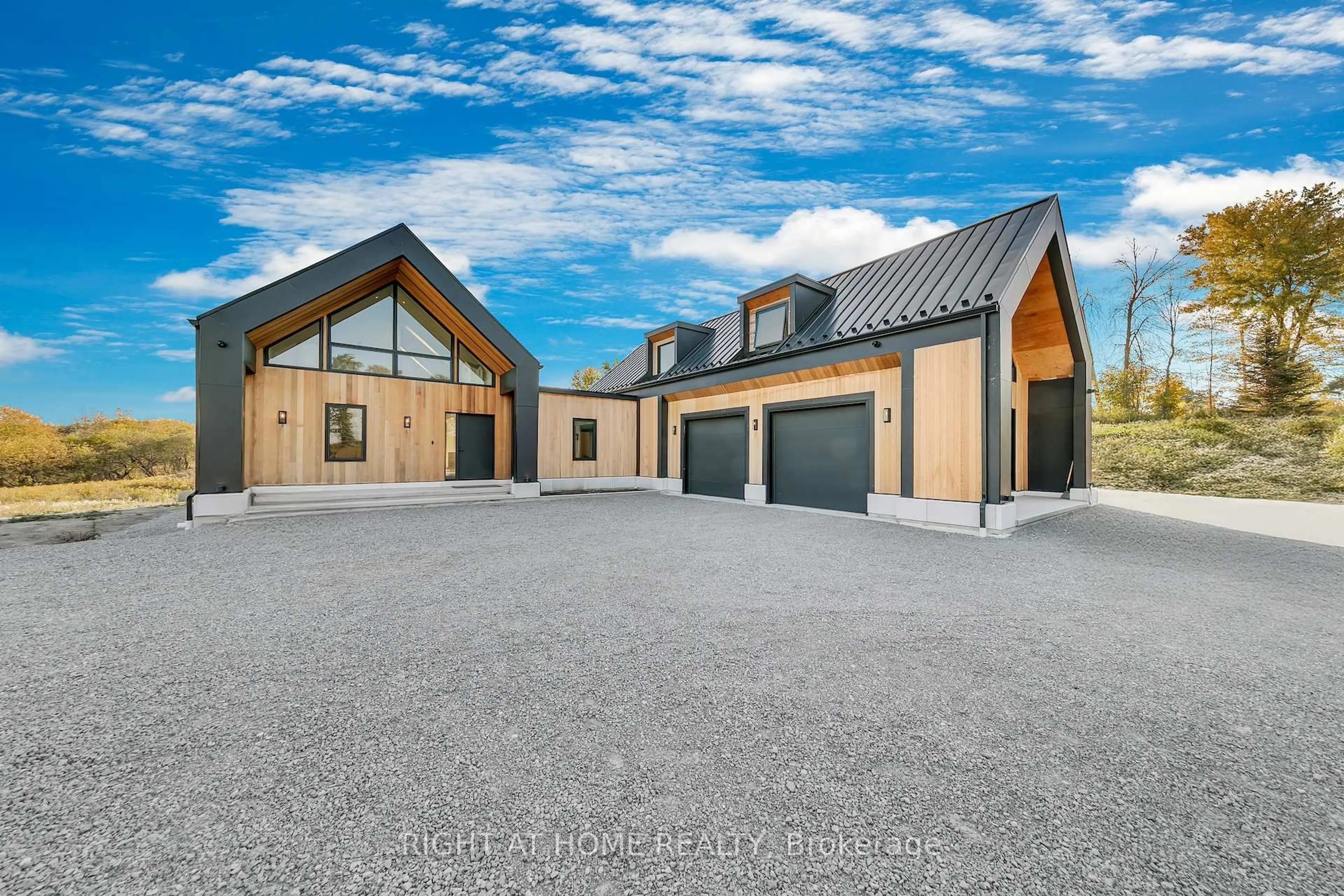 A pic from outside/outdoor area/front of a property/back of a property/a pic from drone, mountain view for 4829 10th Line, New Tecumseth Ontario L0G 1A0