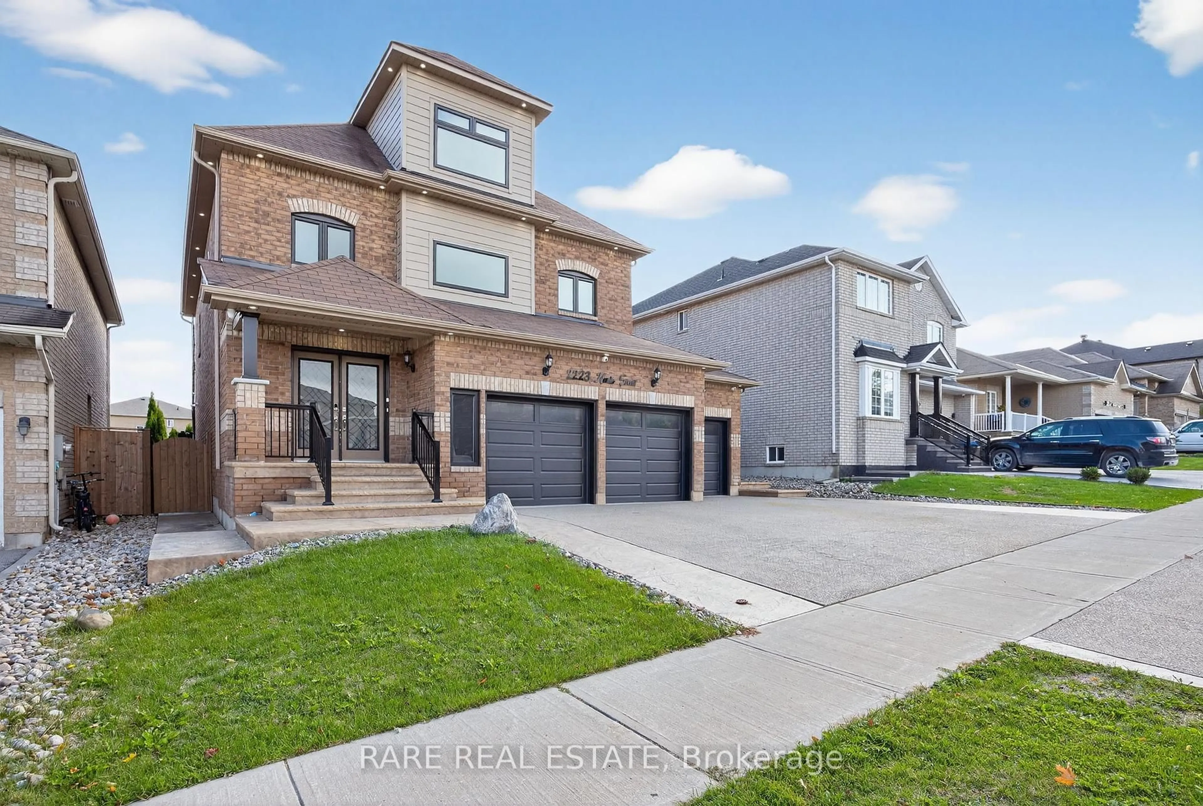 Home with brick exterior material, street for 2223 Nevils St, Innisfil Ontario L9S 0E2
