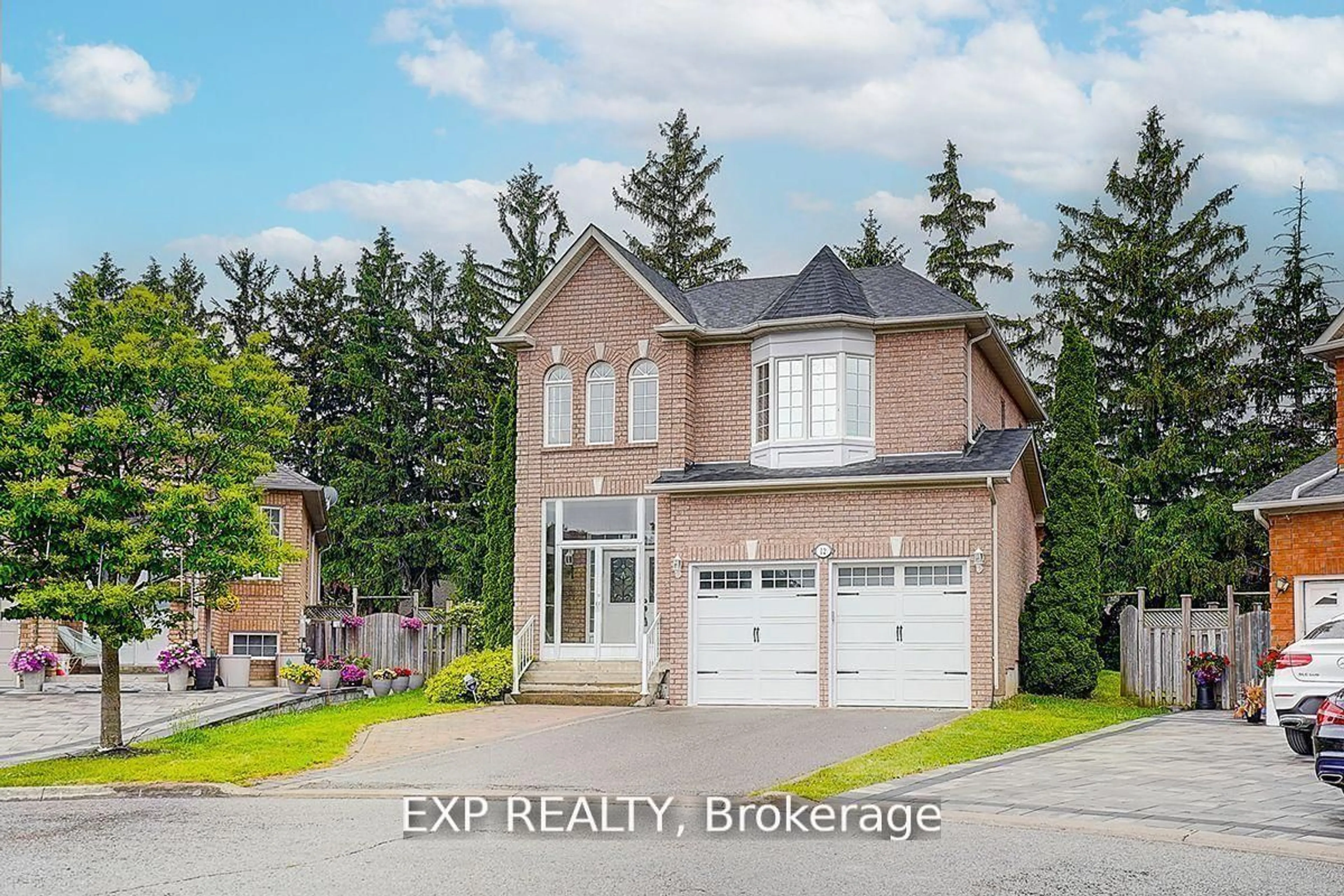 Home with brick exterior material, street for 12 Tormina Crt, Markham Ontario L3S 4R2