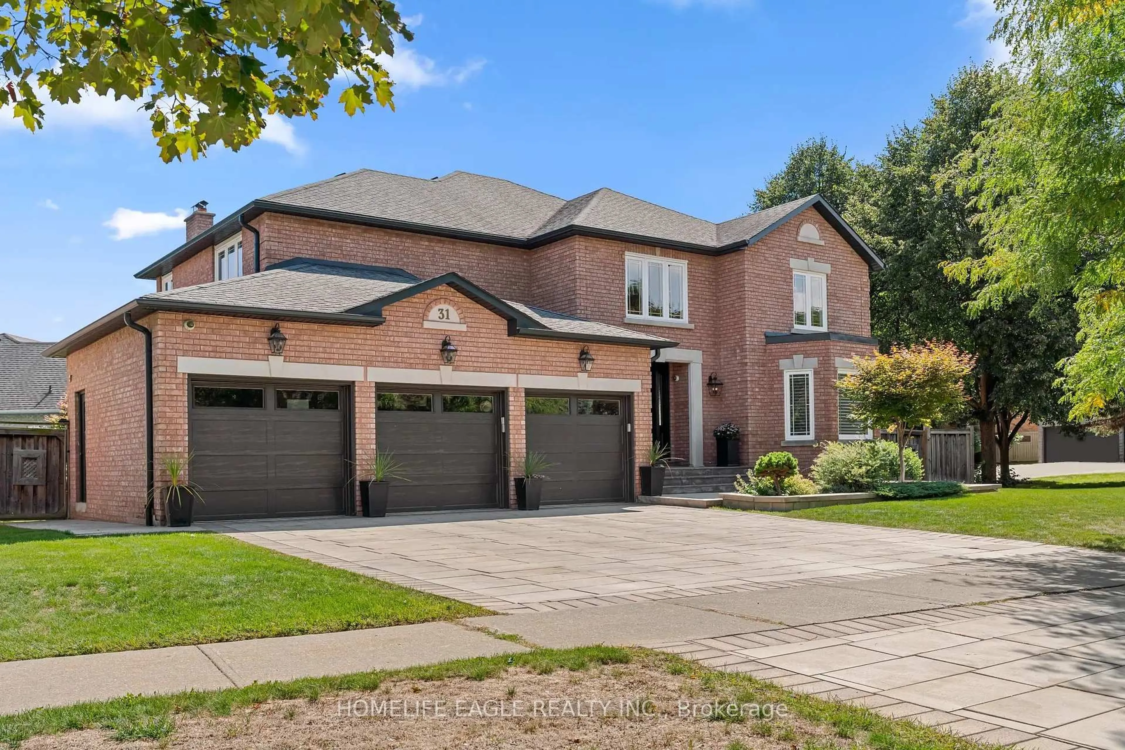 Home with brick exterior material, street for 31 Modesto Gdns, Vaughan Ontario L4L 8C9