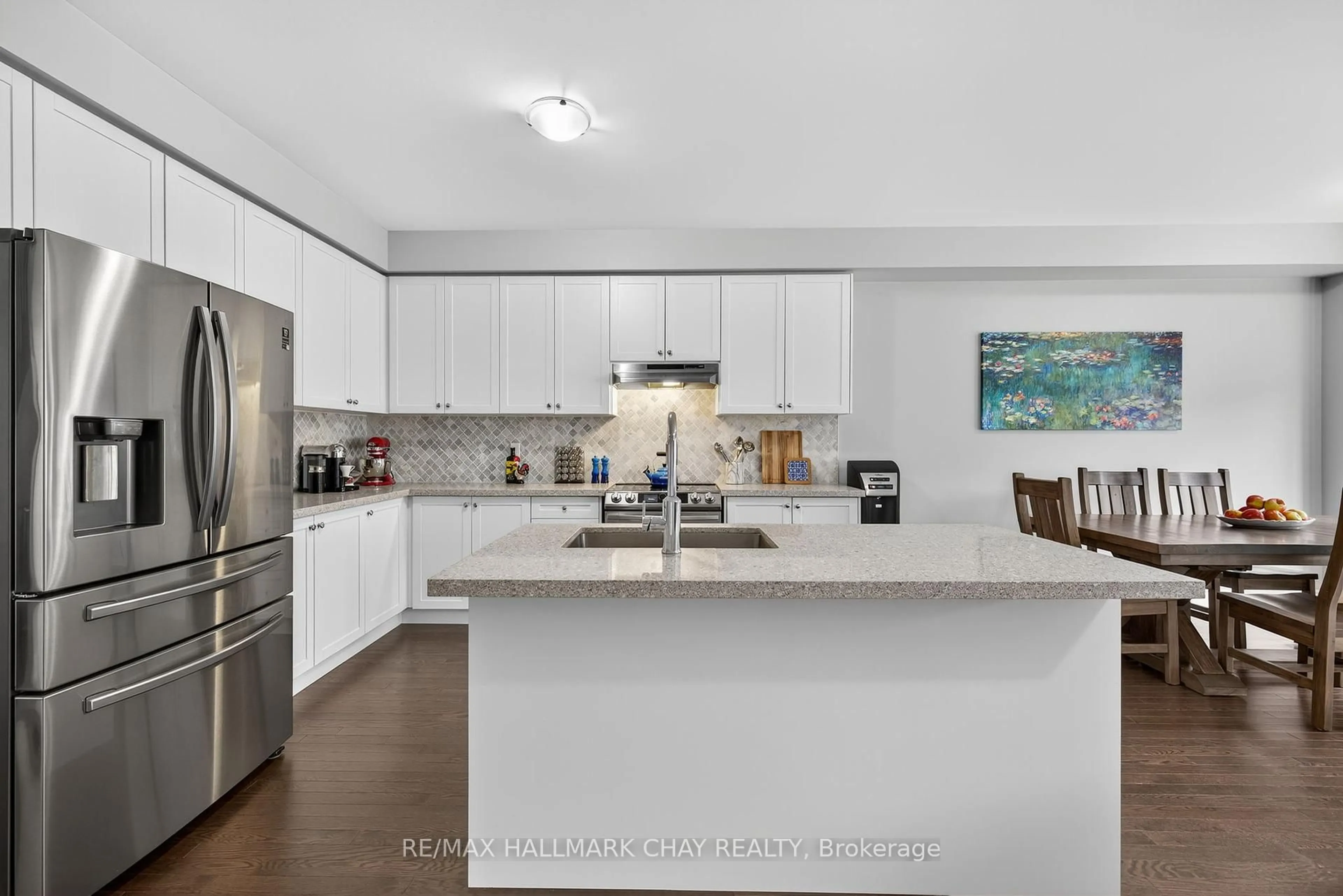 Open concept kitchen, unknown for 45 Lorne Thomas Pl, New Tecumseth Ontario L9R 0T8